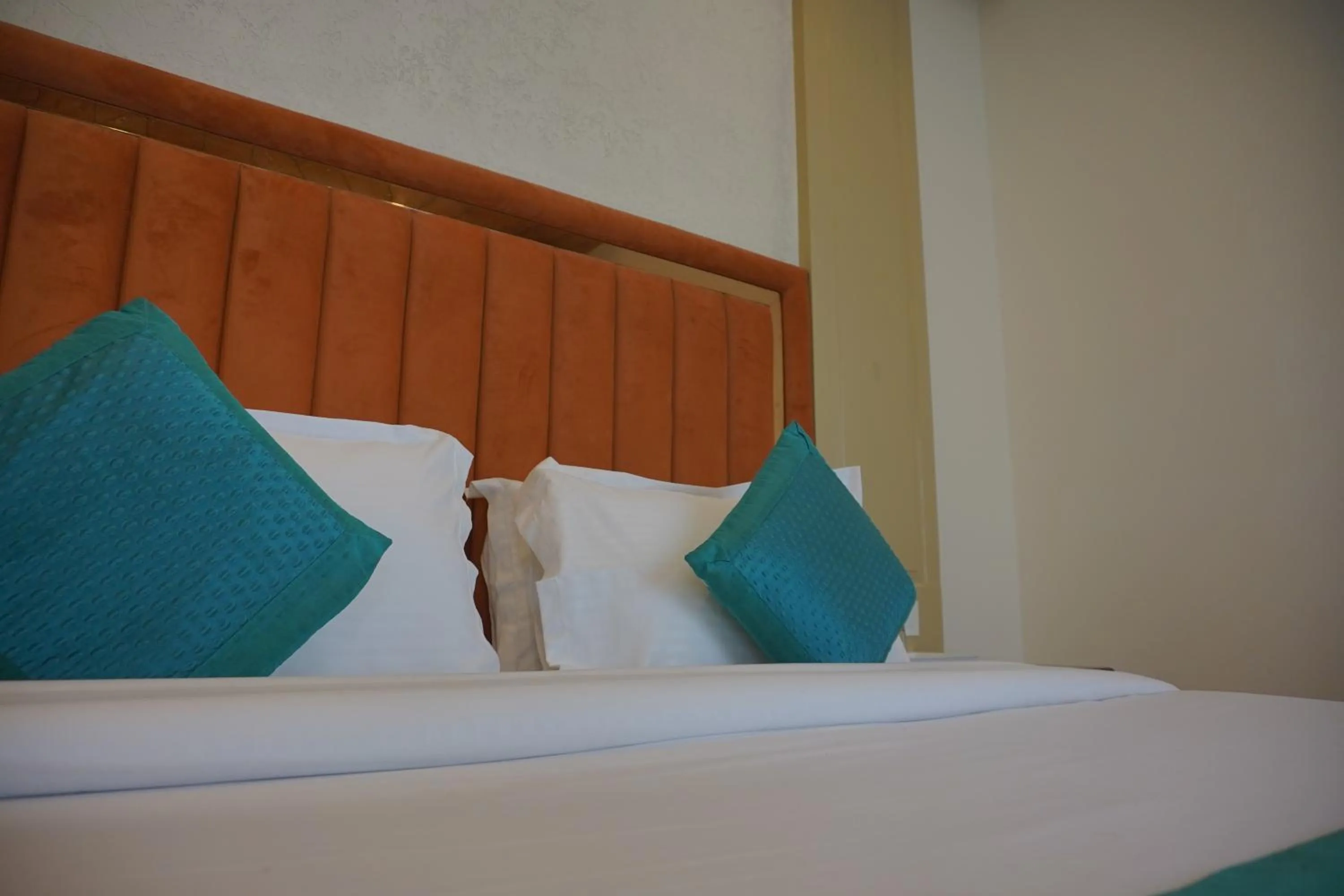 Bed in Luxury Inn by Stotrak Hotels