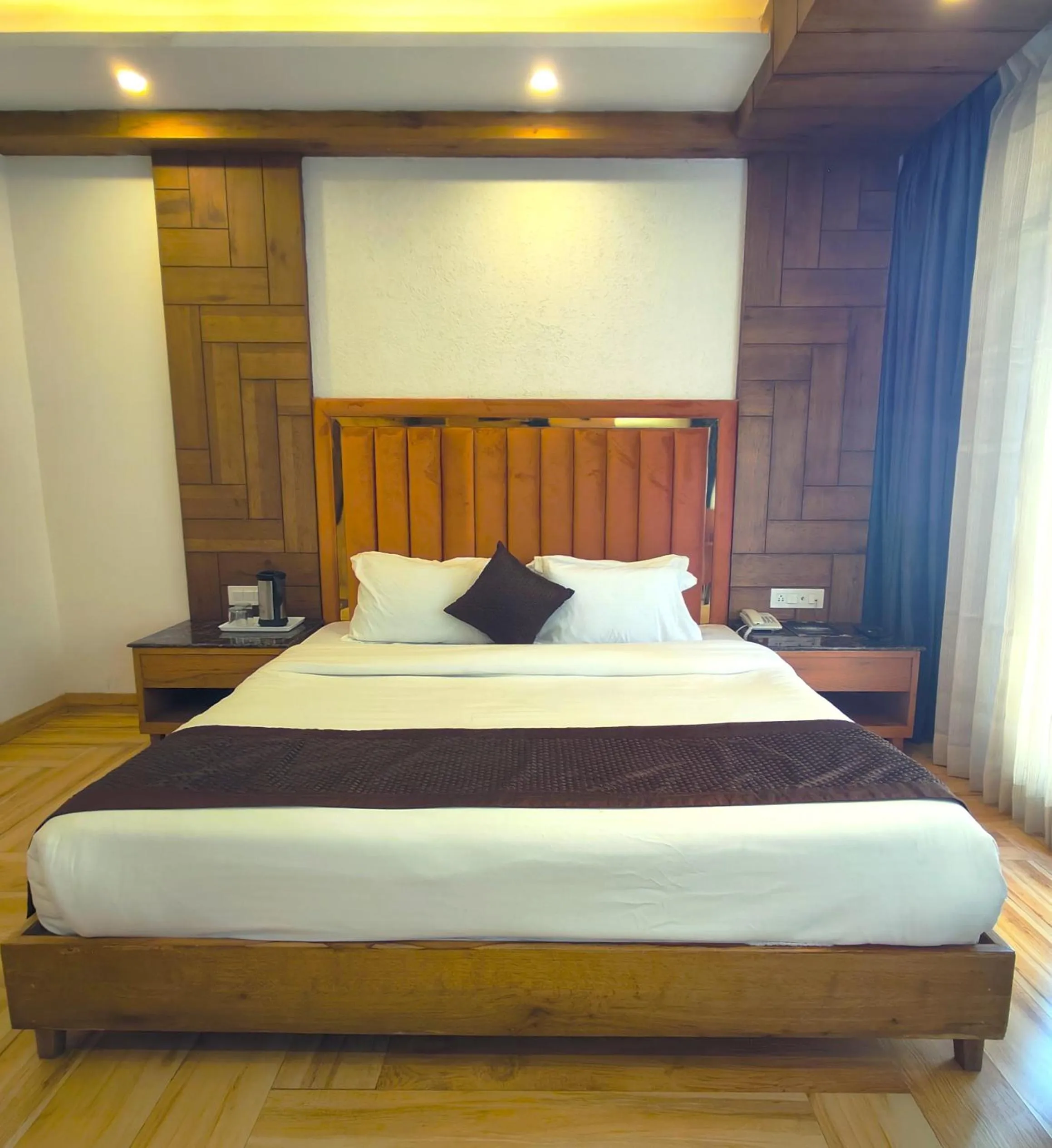 Bed in Luxury Inn by Stotrak Hotels