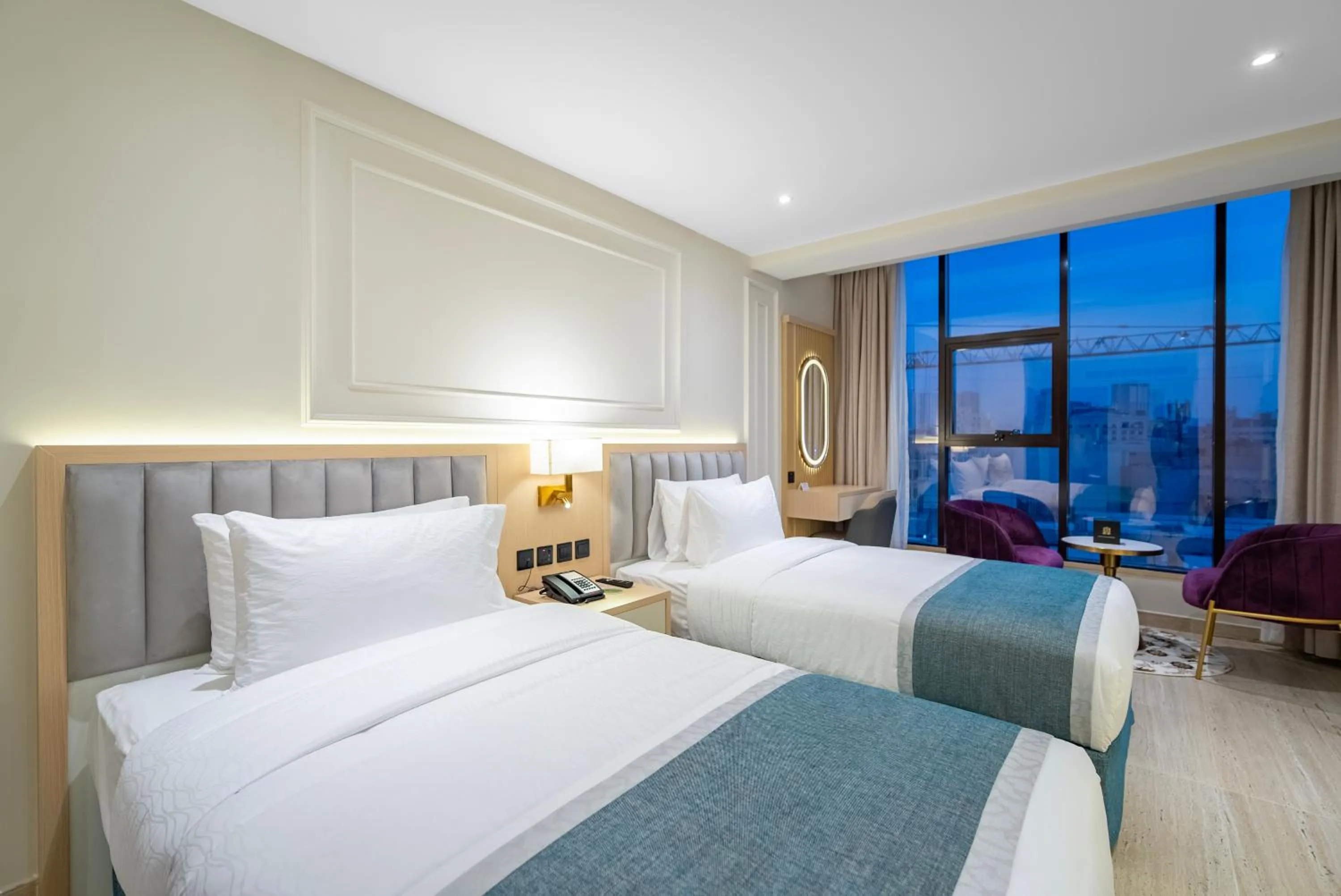 Bedroom, Bed in Grand Ambassador Hotel