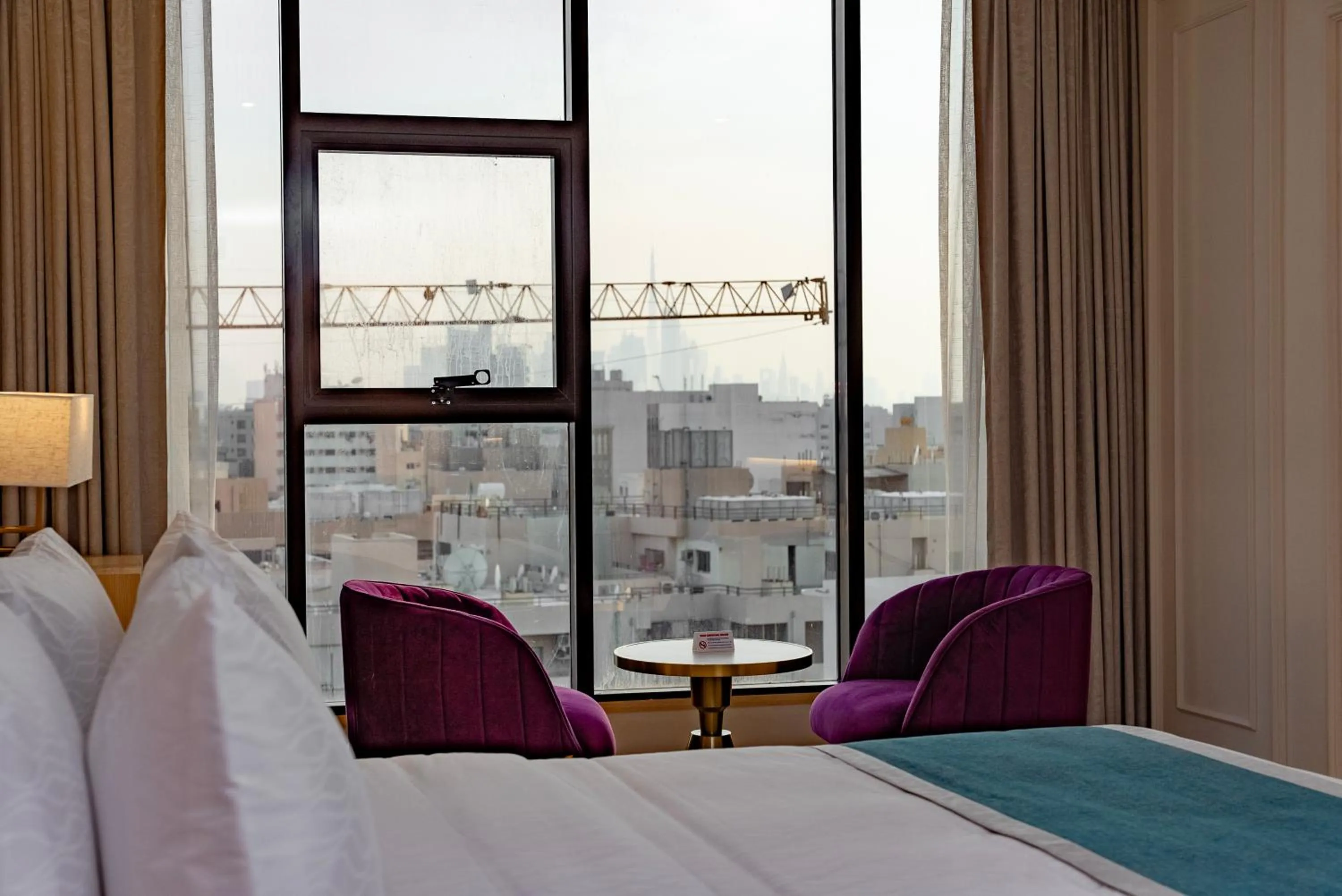 Bedroom, Bed in Grand Ambassador Hotel