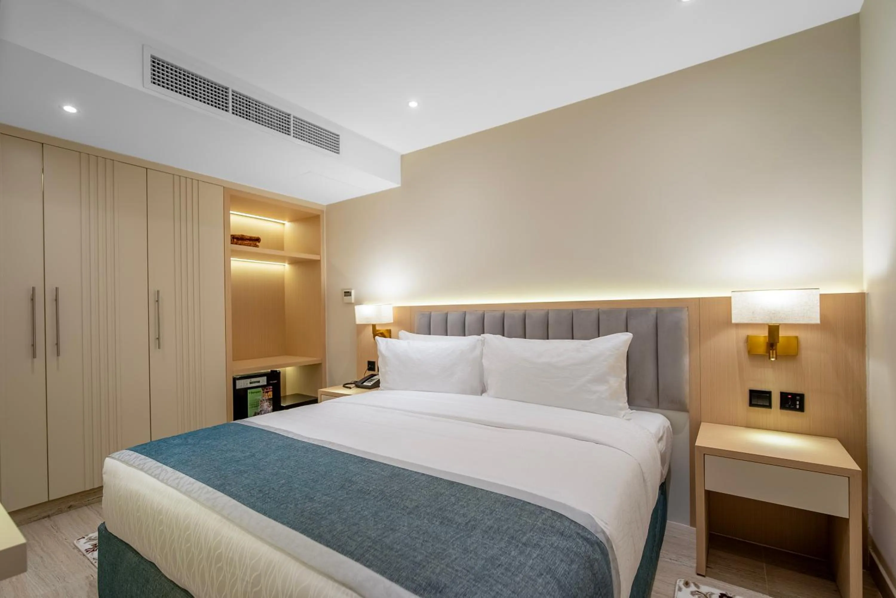 Bedroom, Bed in Grand Ambassador Hotel