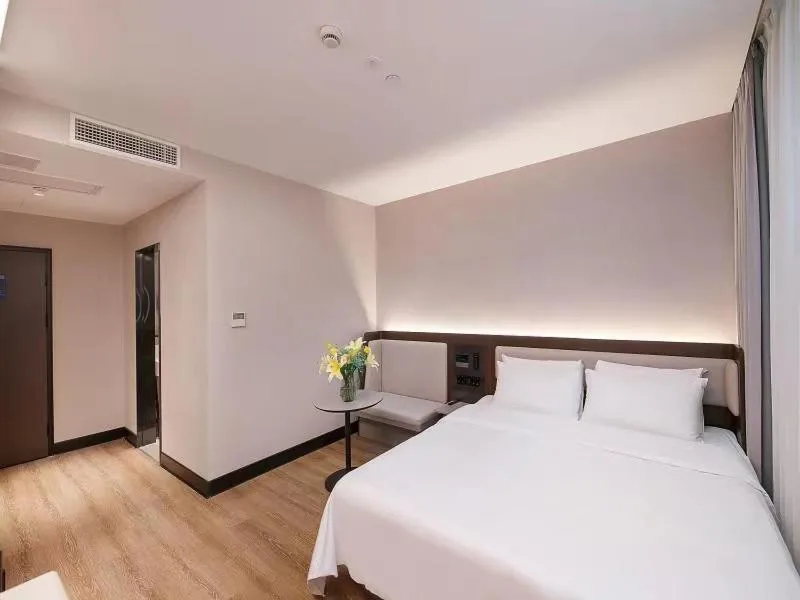 Bedroom in Hanting Hotel Shanghai Babaiban Pudian Road Subway Station