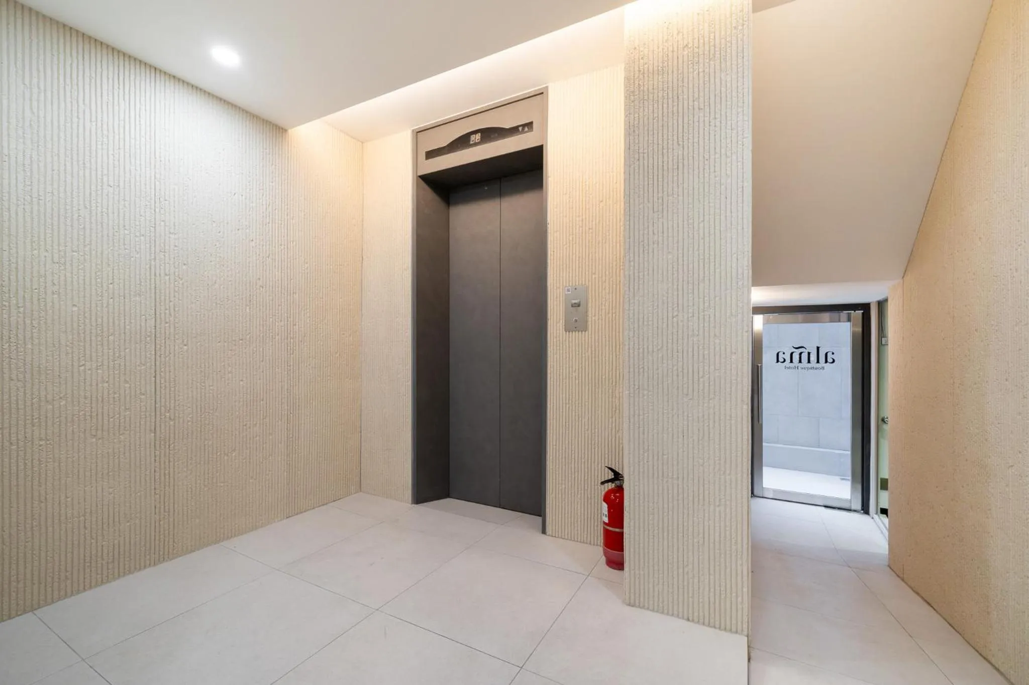 Lobby or reception in Alma Hotel