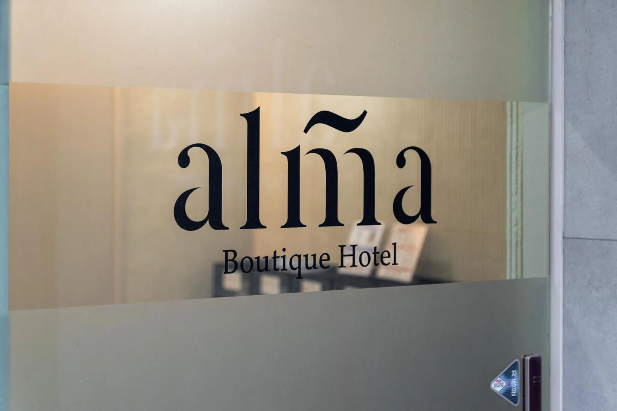 Facade/entrance in Alma Hotel