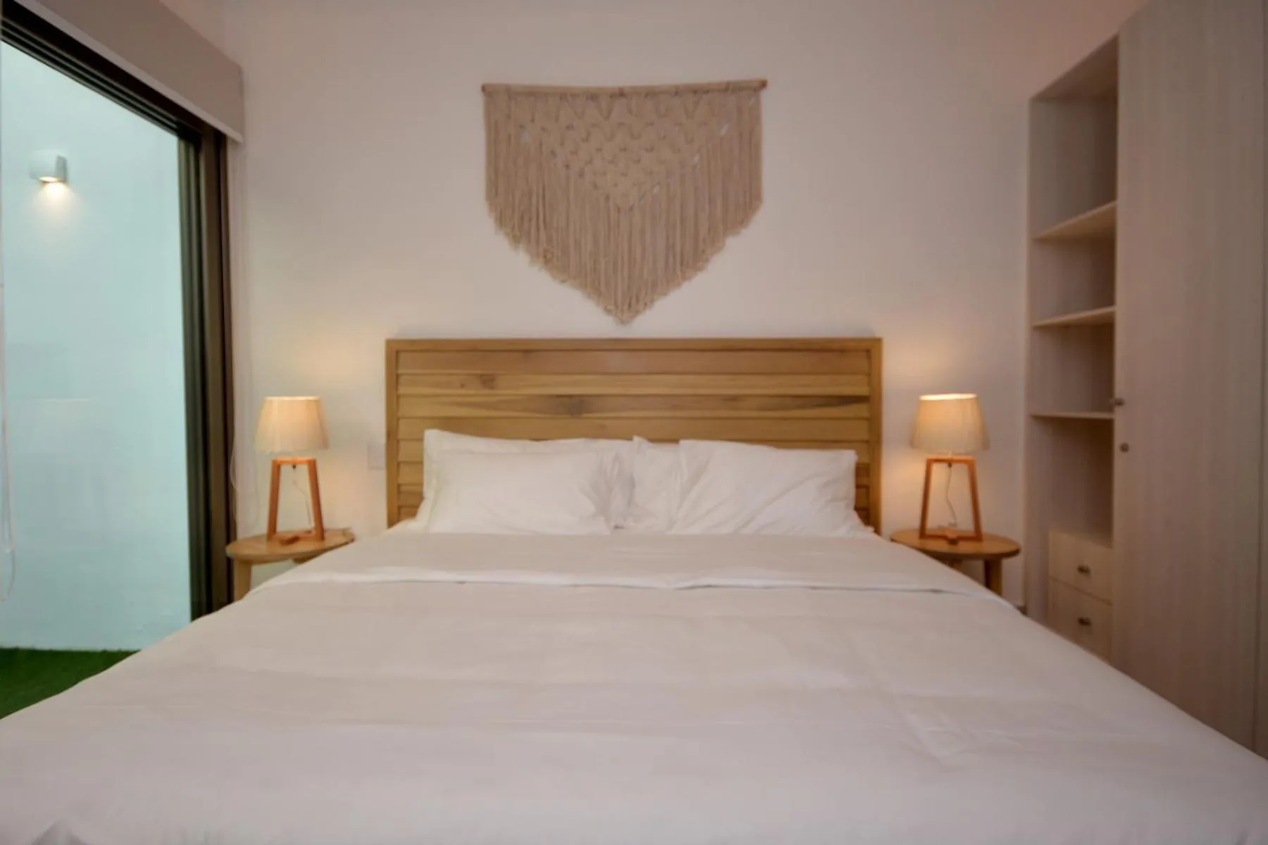 Bed in Mayan Monk Suites