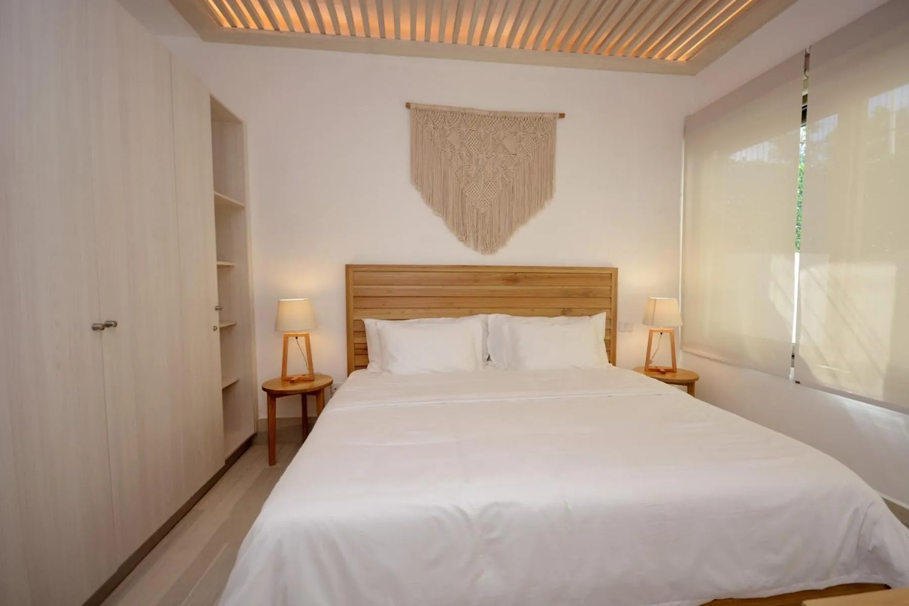Bed in Mayan Monk Suites