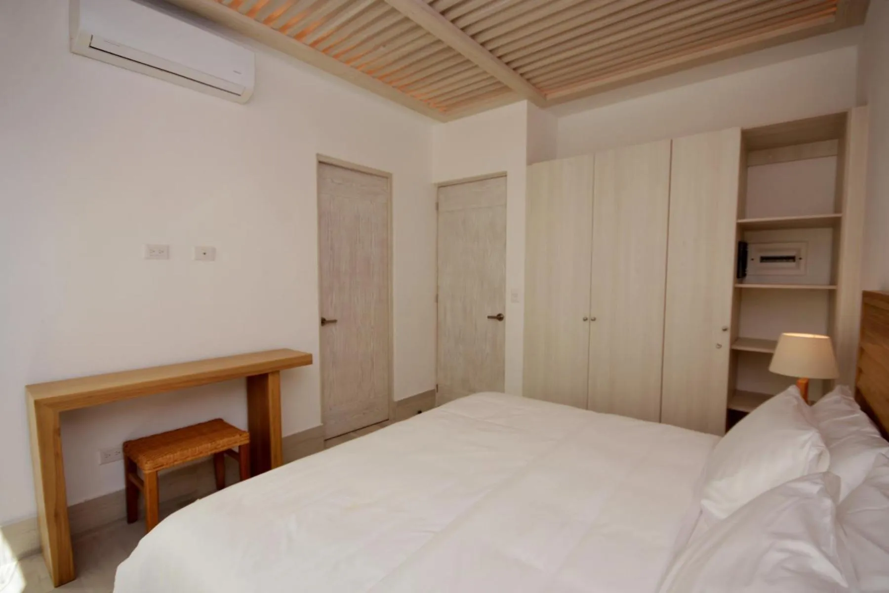 Bed in Mayan Monk Suites