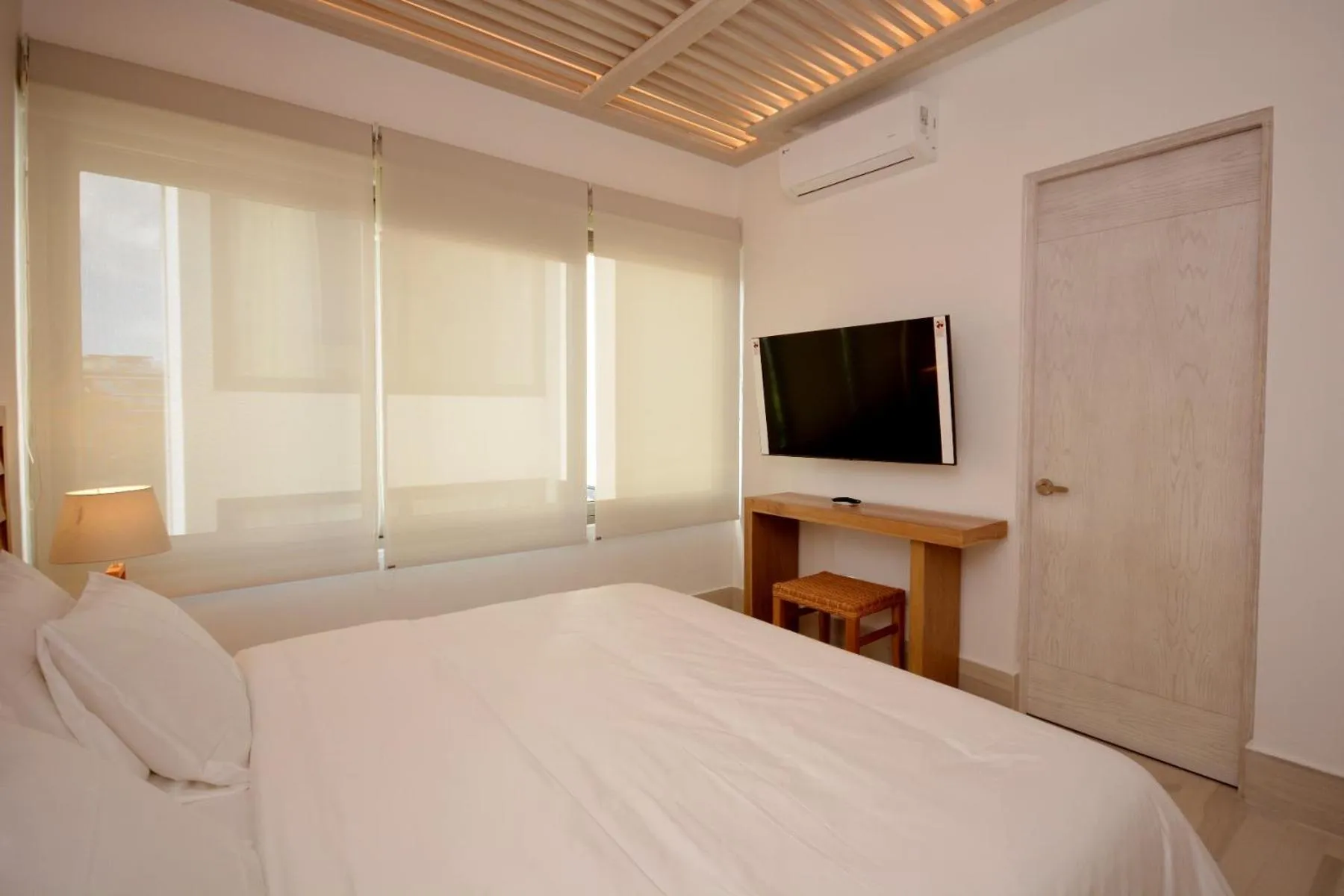 Bed in Mayan Monk Suites