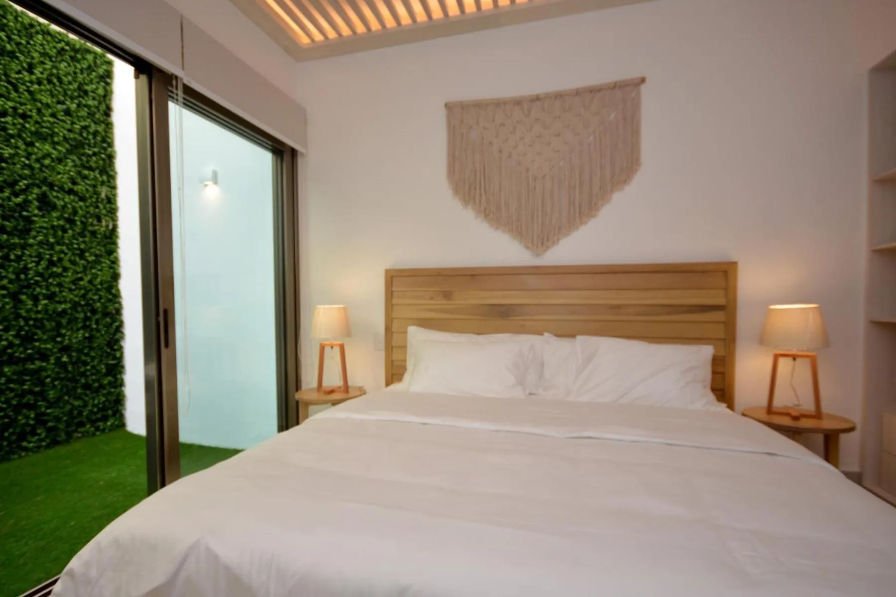 Bed in Mayan Monk Suites