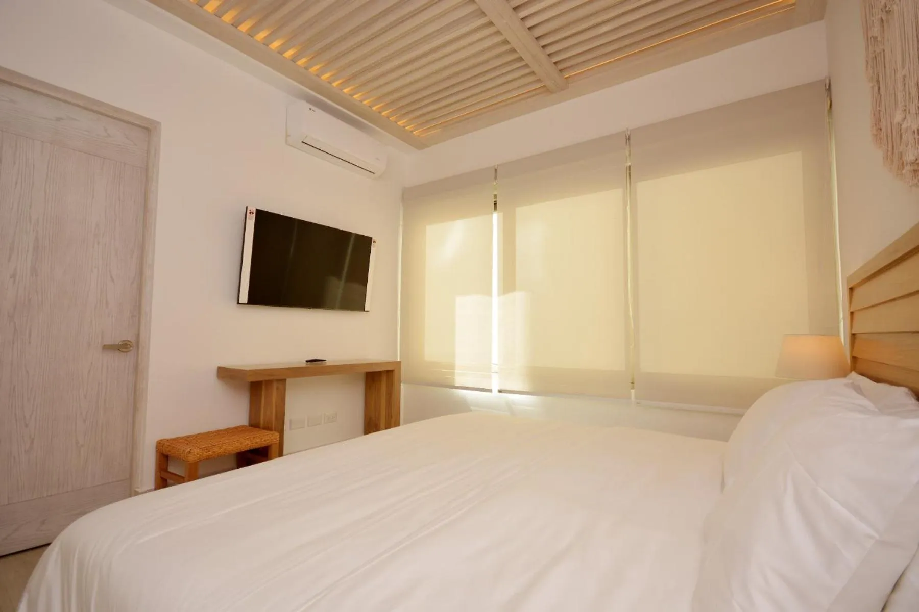 Bed in Mayan Monk Suites