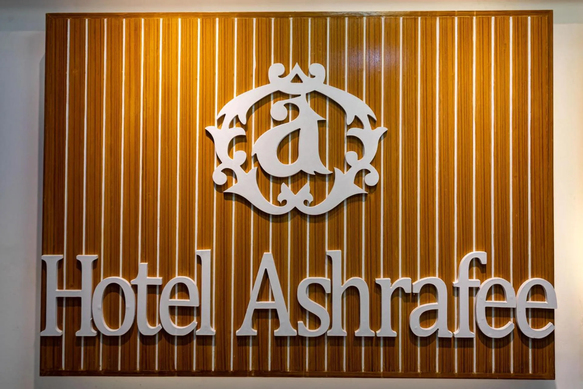 Property logo or sign in Hotel Ashrafee