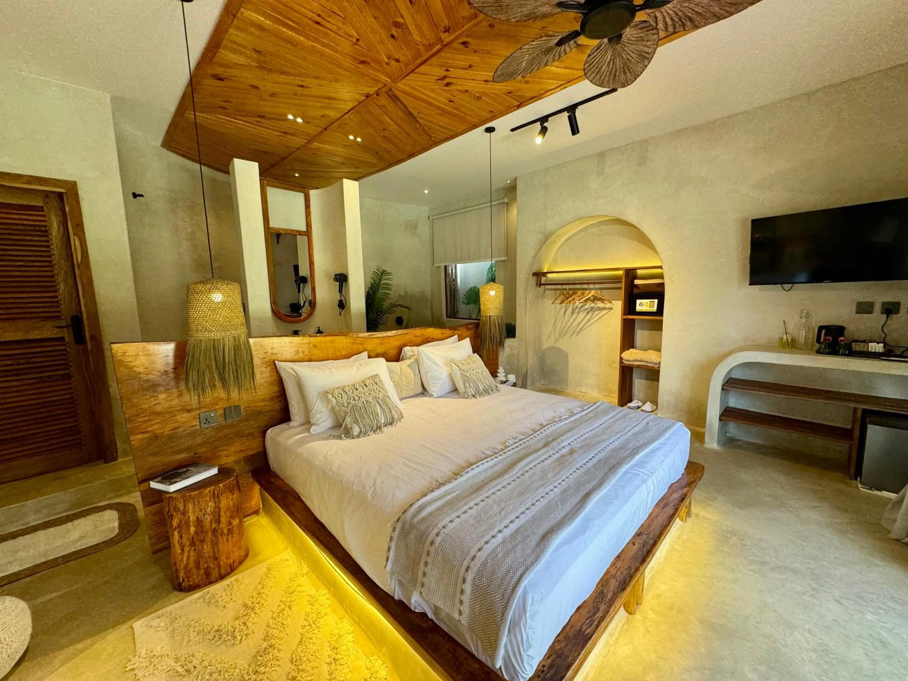 Bed in Kai Zanzibar Hotel and Spa