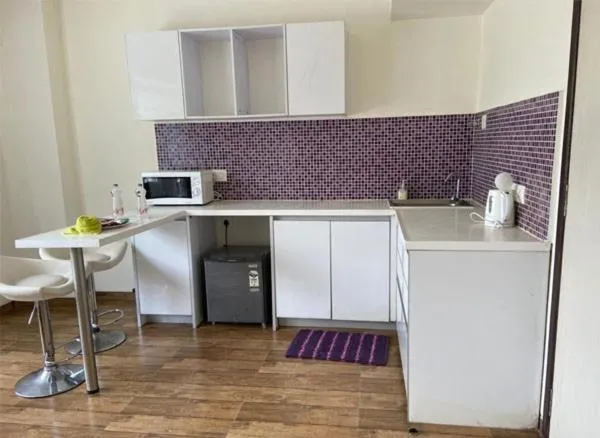 Kitchen or kitchenette in Rajhans Belliza By Honest Homes