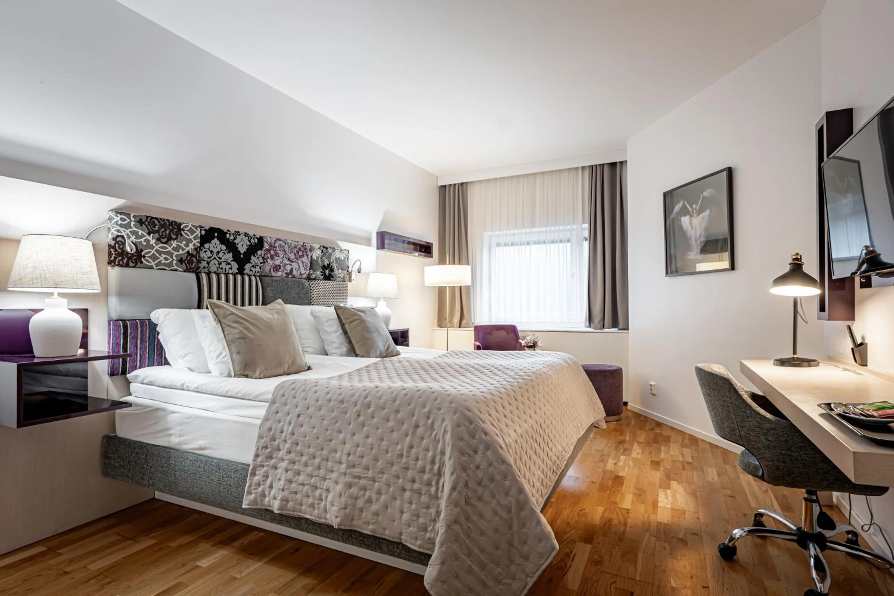 Bed in Injoy Premium Hotel Solna