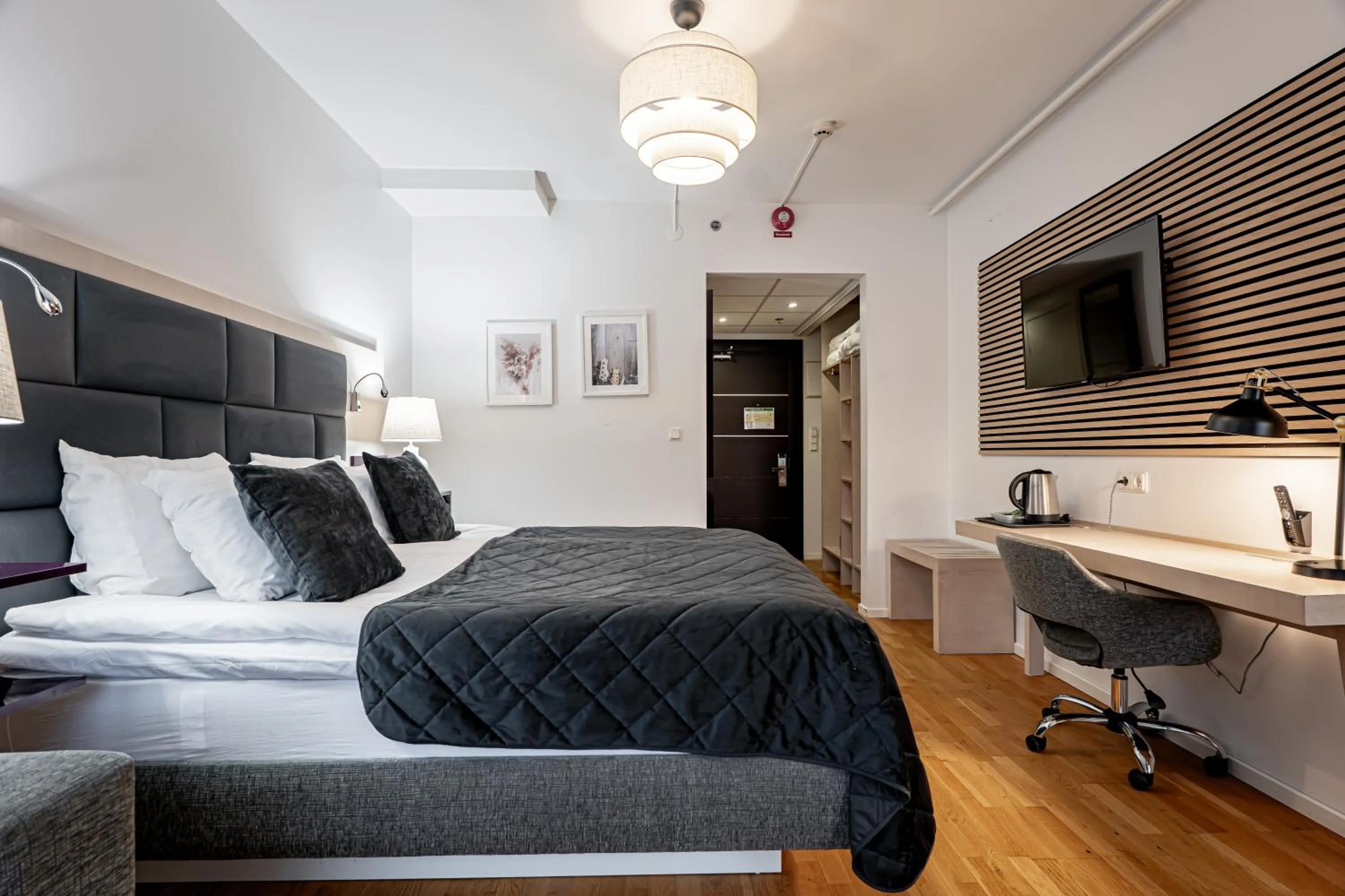 Bed in Injoy Premium Hotel Solna