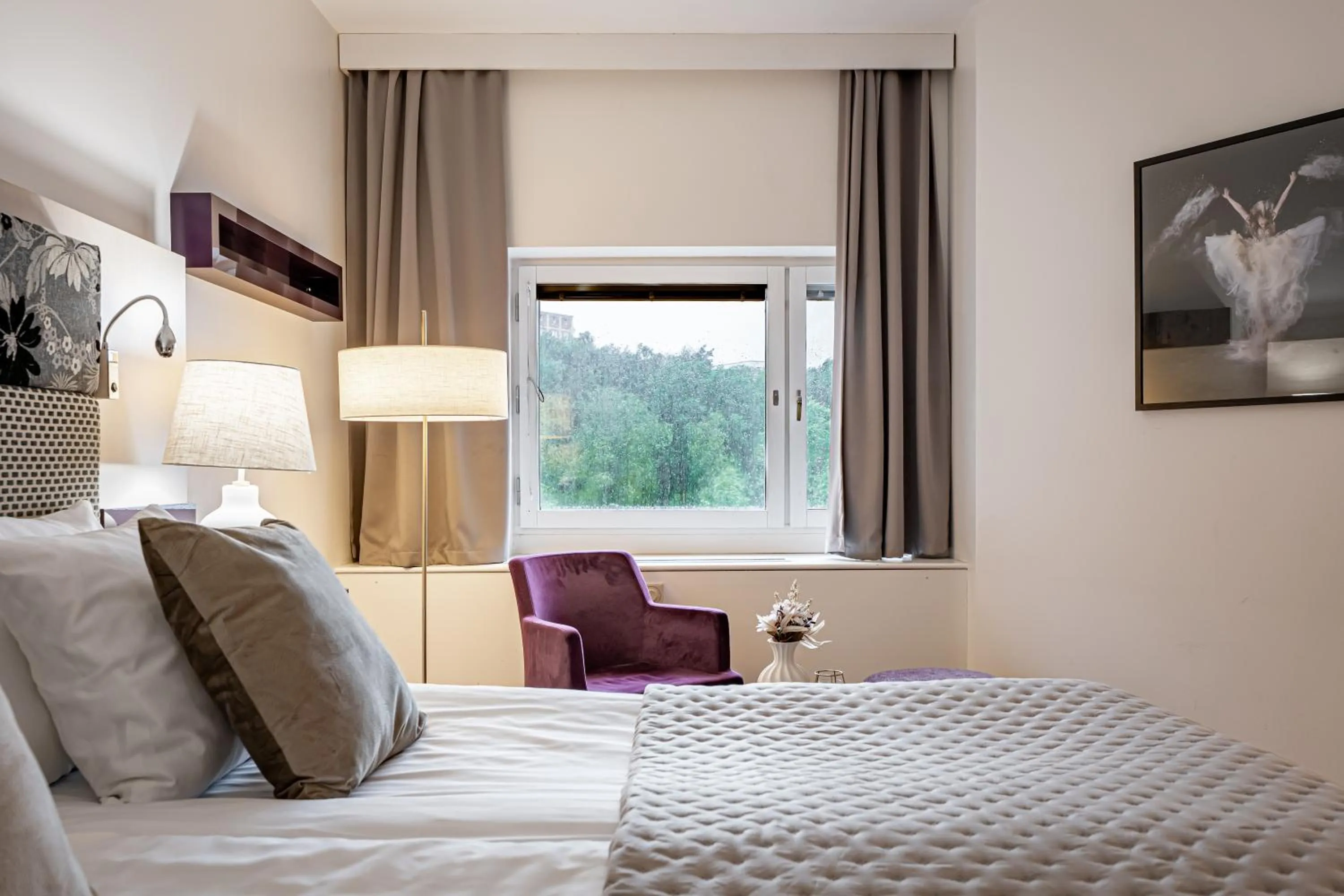 Bed in Injoy Premium Hotel Solna