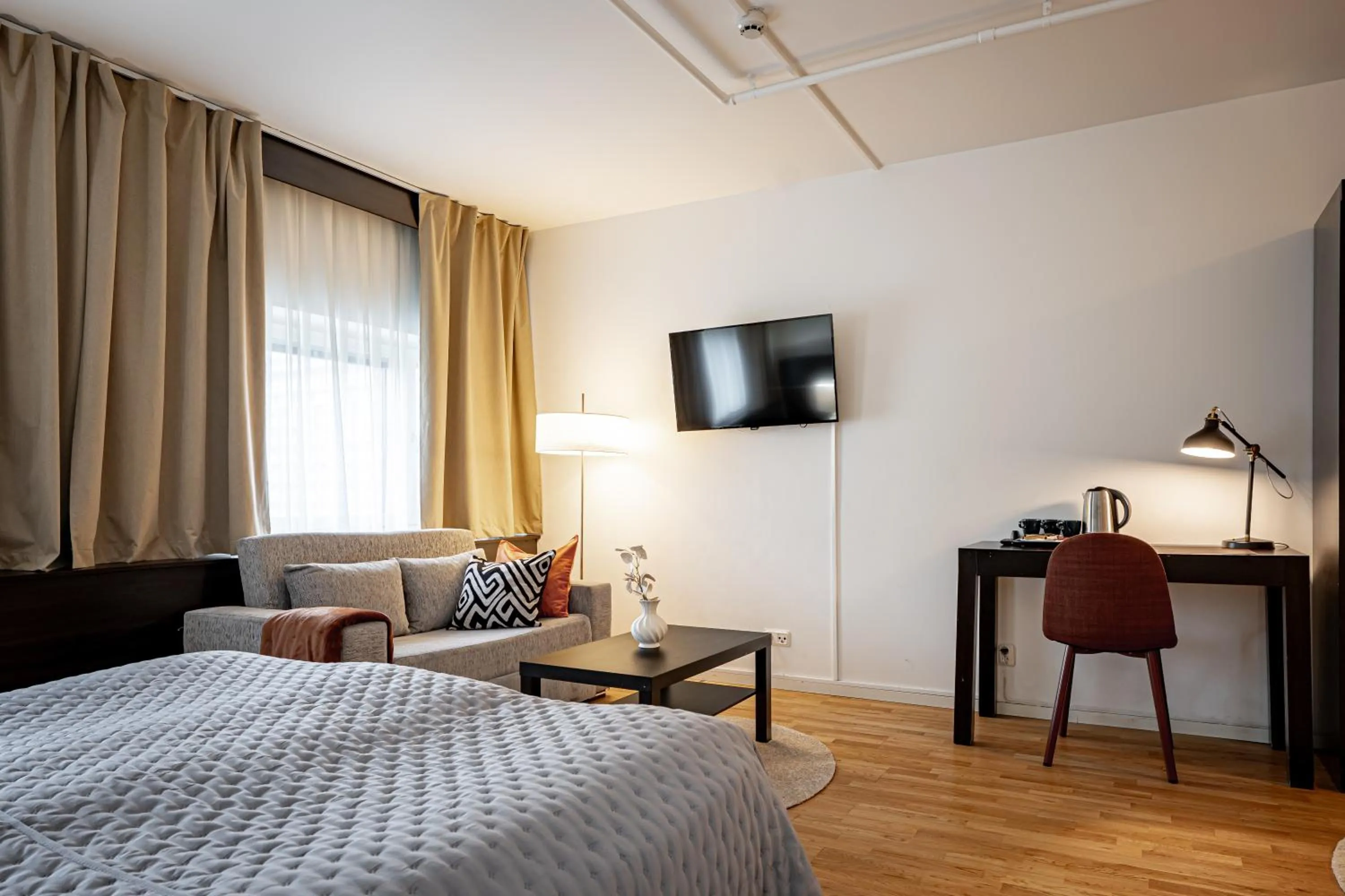 Bed in Injoy Premium Hotel Solna