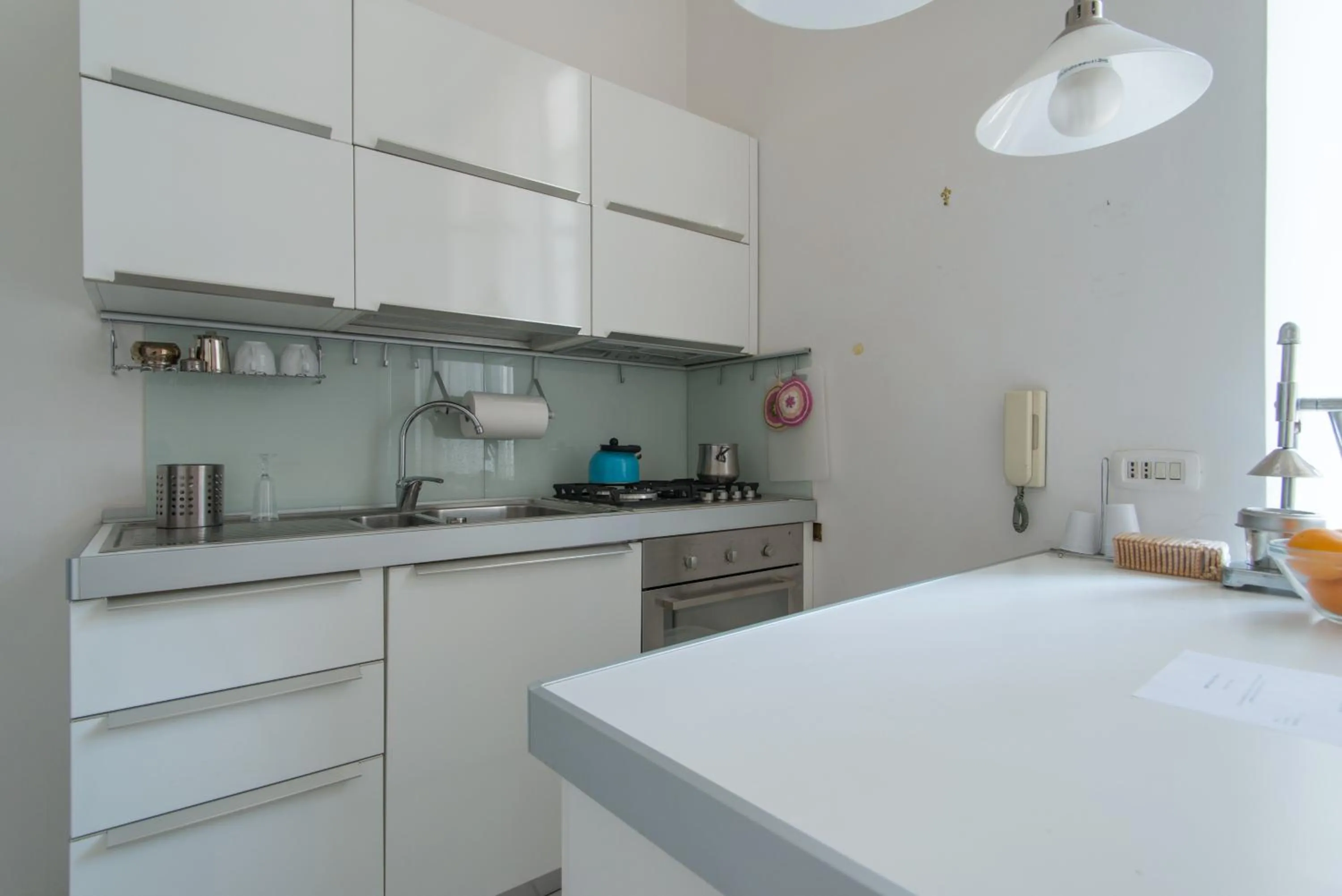 Kitchen or kitchenette in Relais Piazza dei Martiri