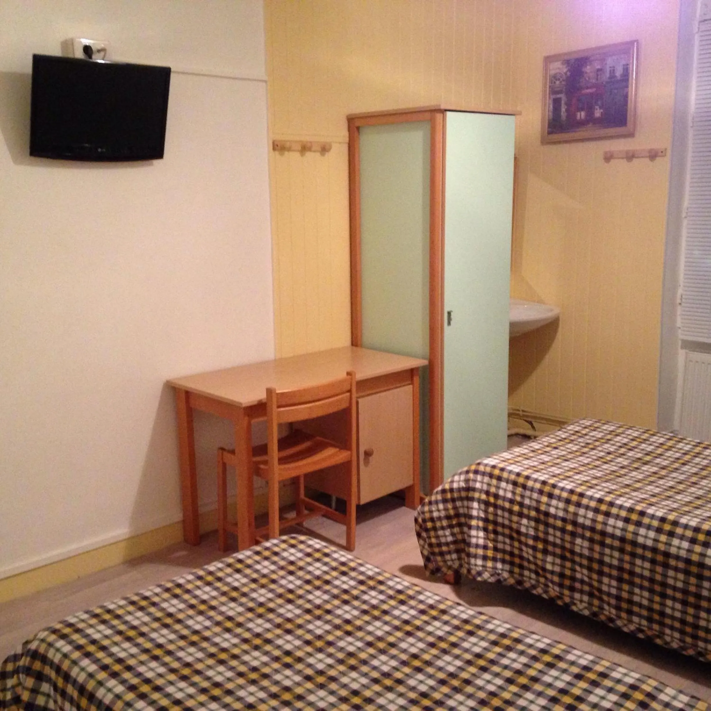 Bed, TV/Entertainment Center in Hotel Le Tram