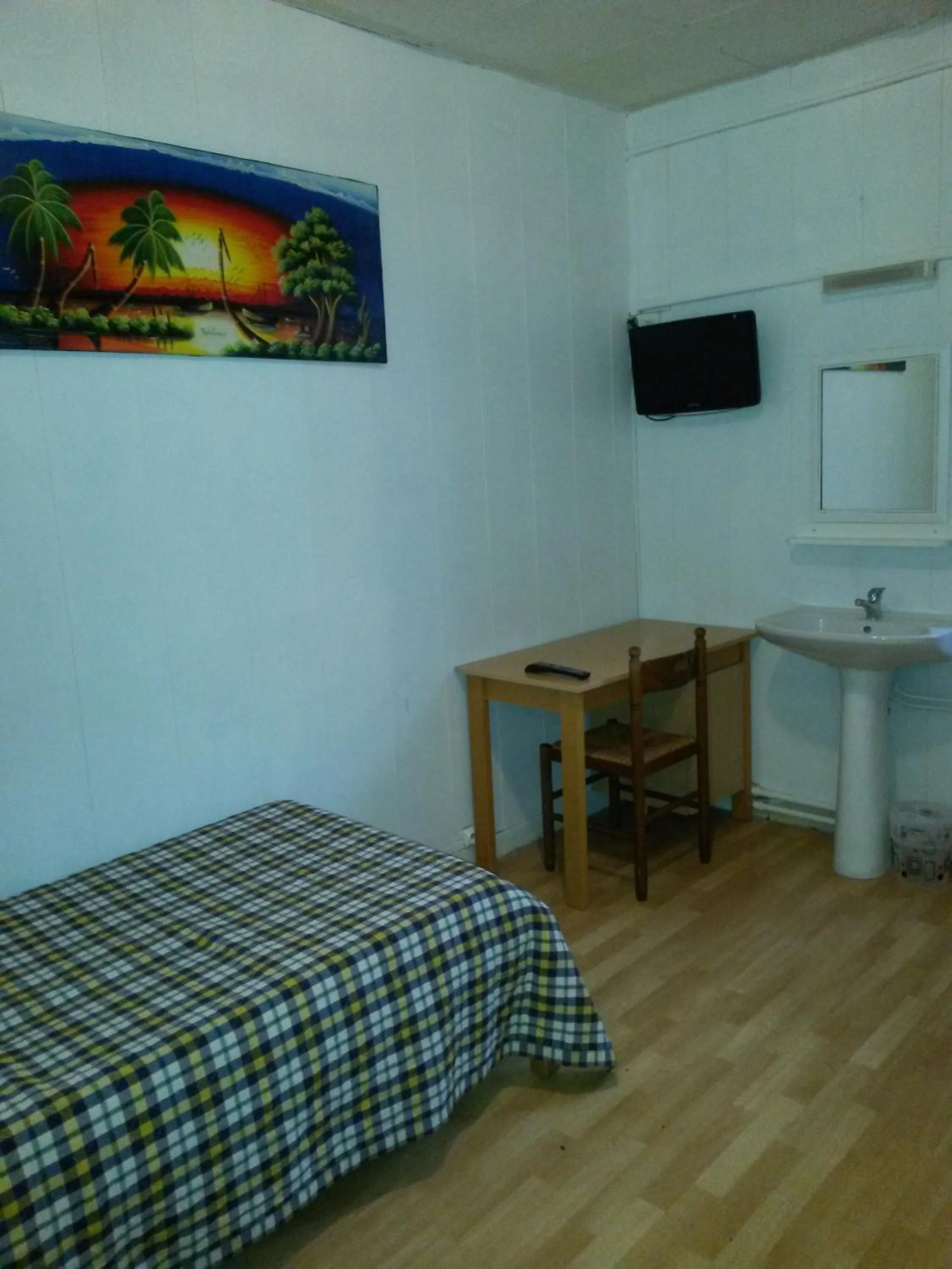 Bed, TV/Entertainment Center in Hotel Le Tram