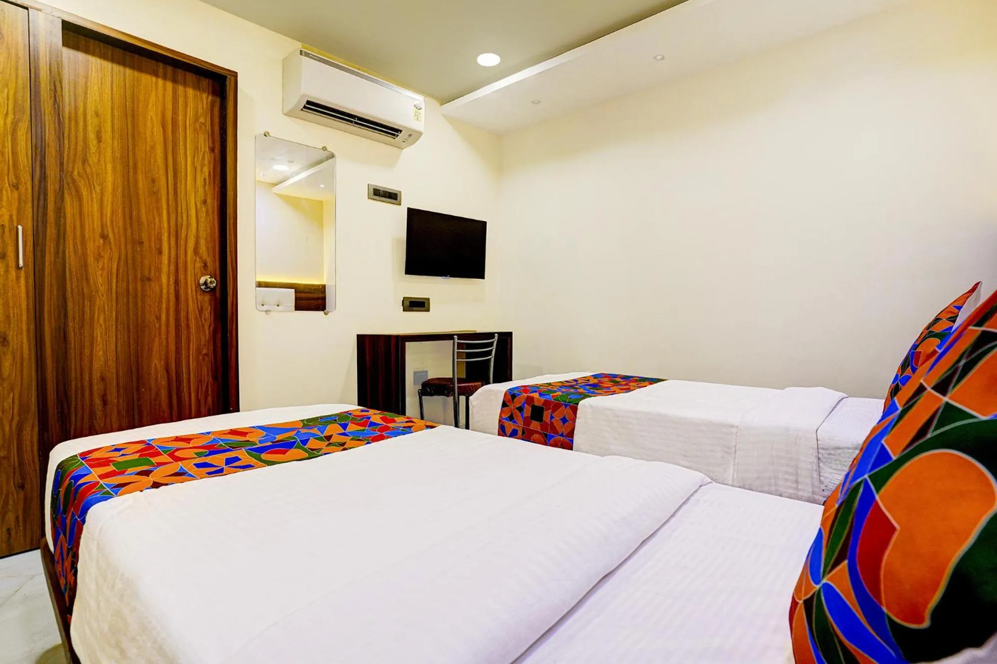 Bed in FabHotel Majestic Crest