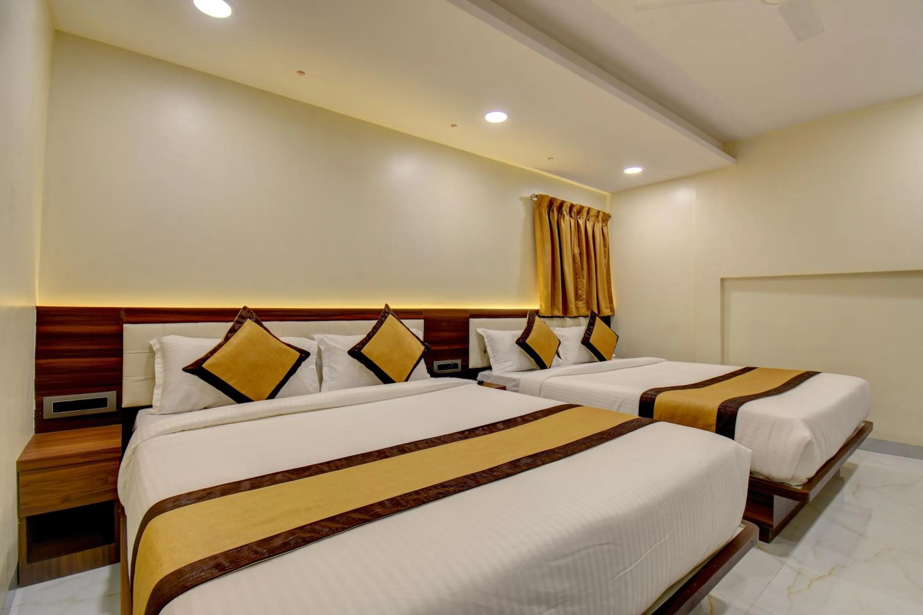 Bed in Hotel Majestic Crest Sakinaka