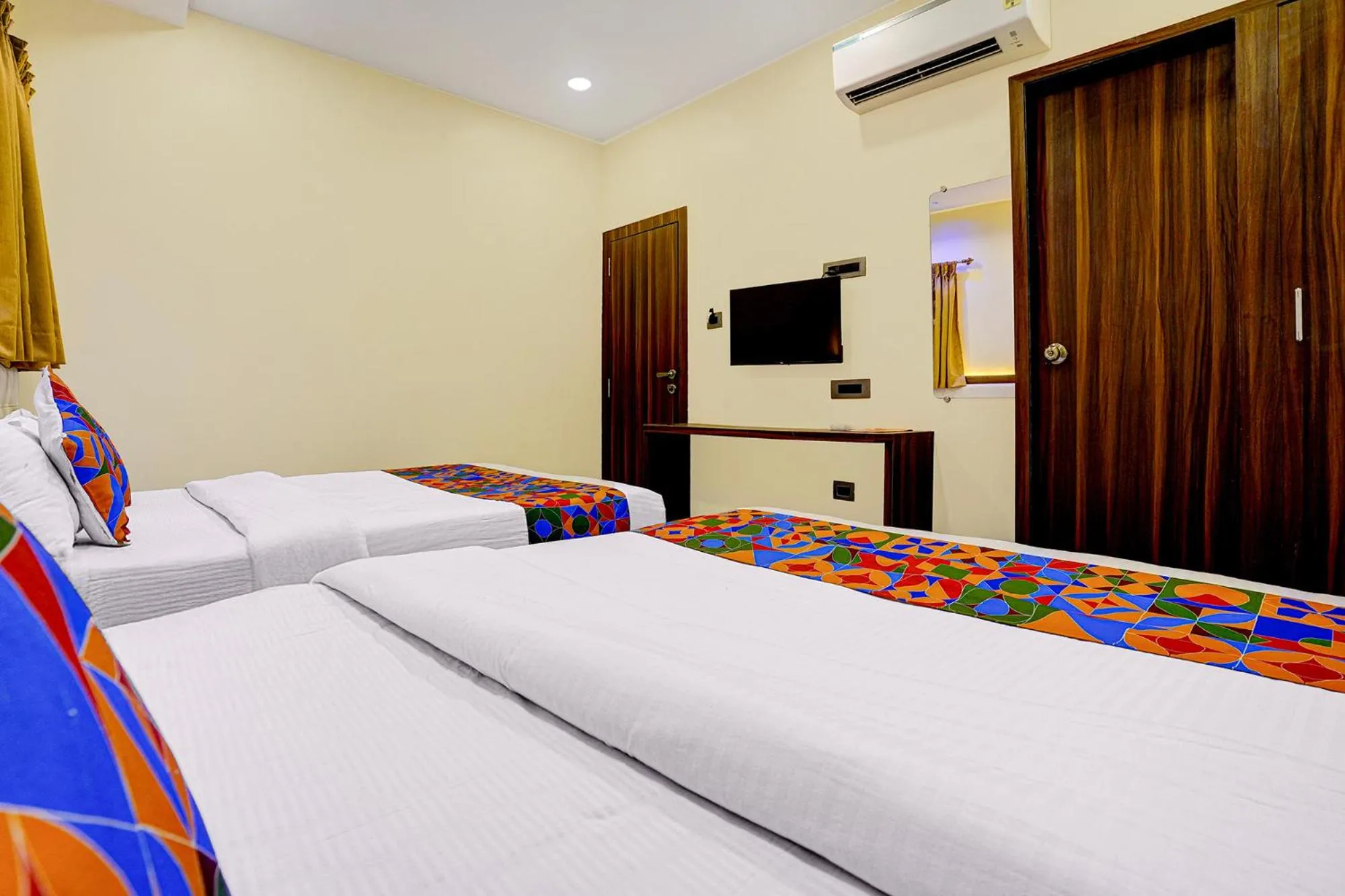 Bed in FabHotel Majestic Crest