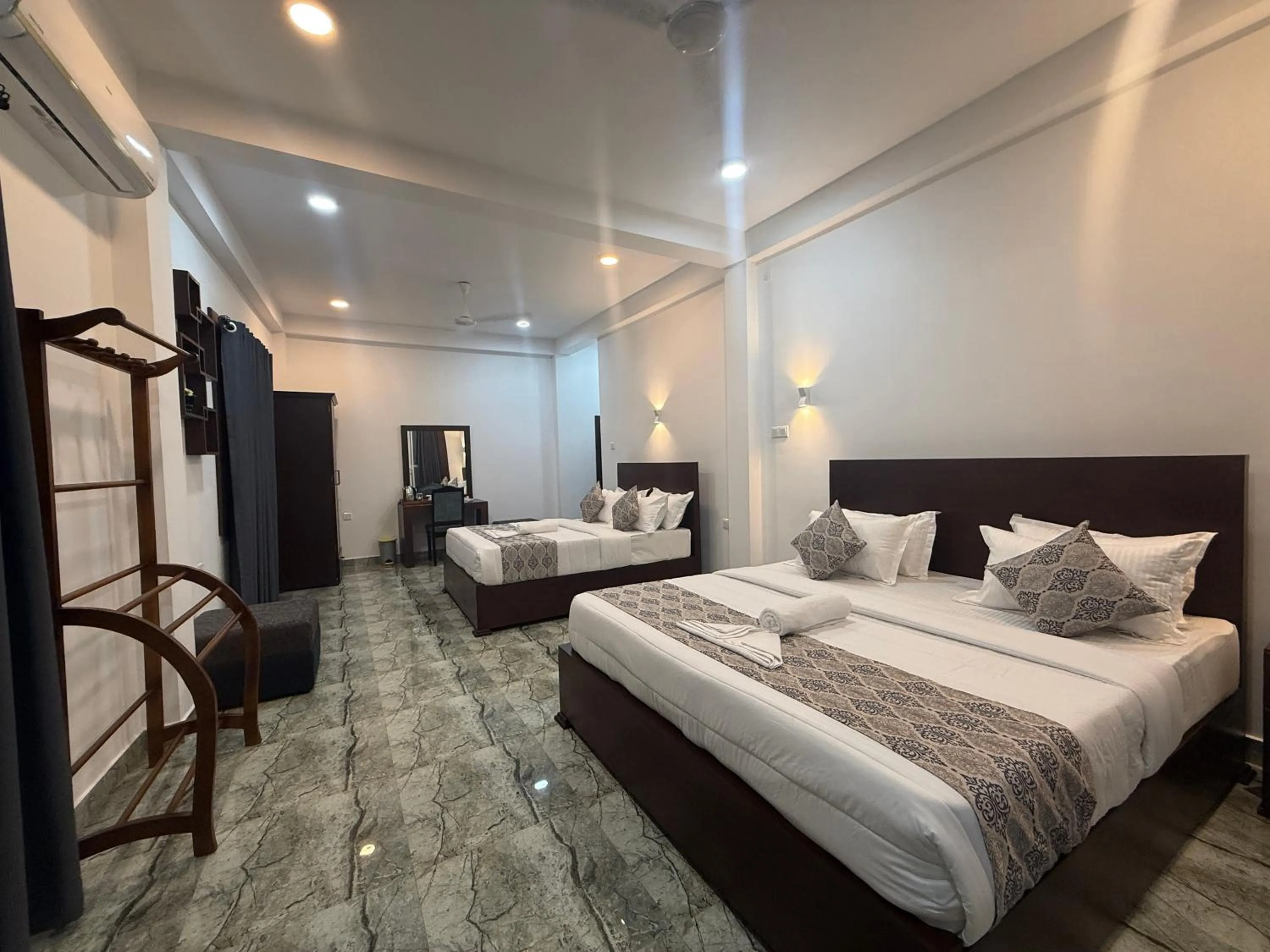 Bed in Aloe Transit Hotel