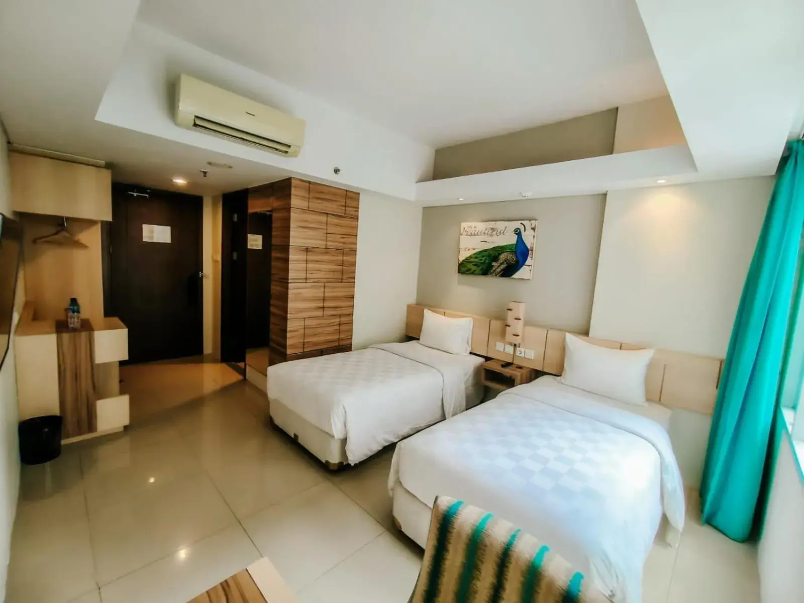 Superior Twin Room in Bogor Icon Condotel By Holla Superior Twin Room in Bogor Icon Condotel By Holla