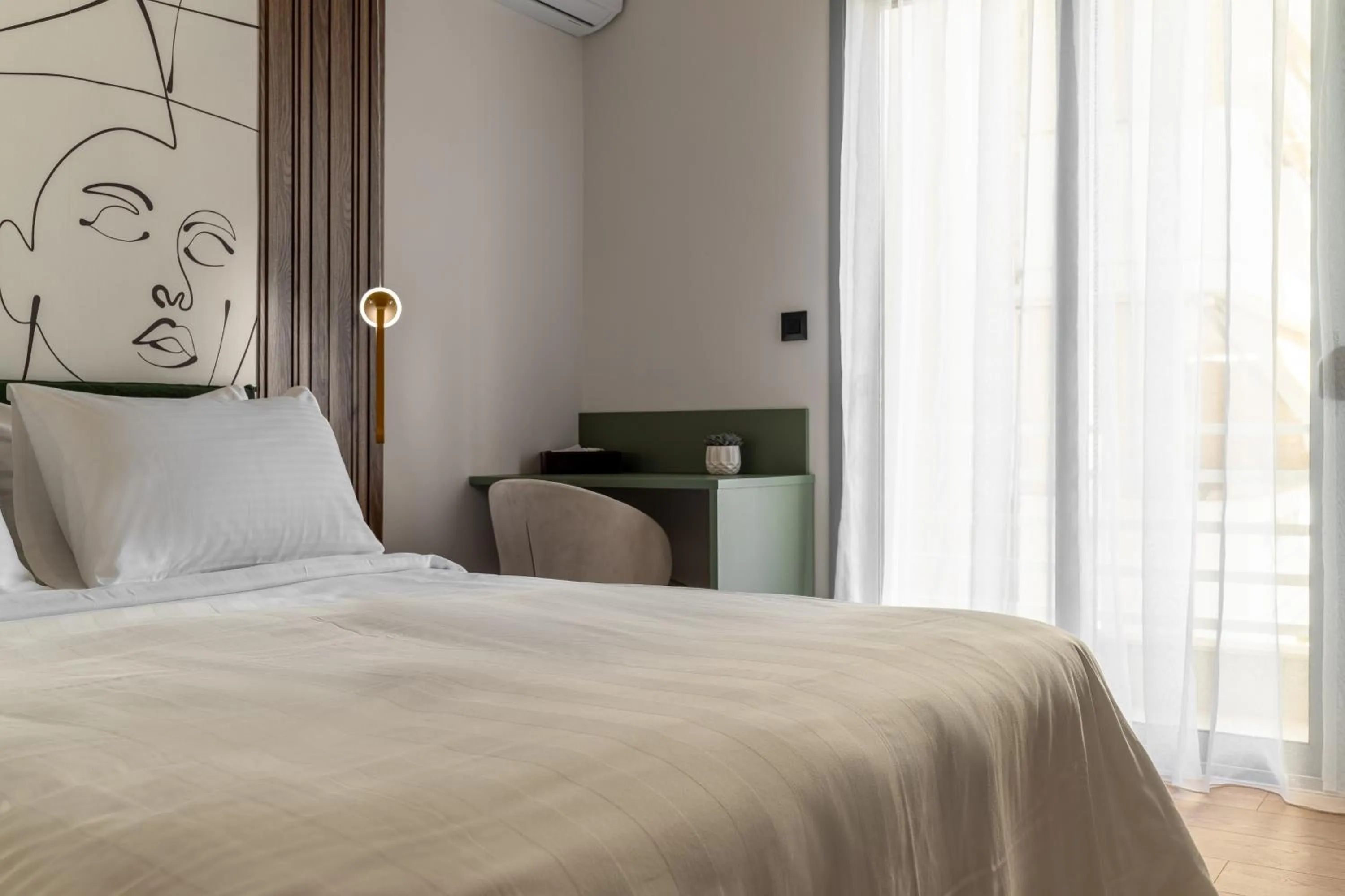 Bed in Phalerus Suites