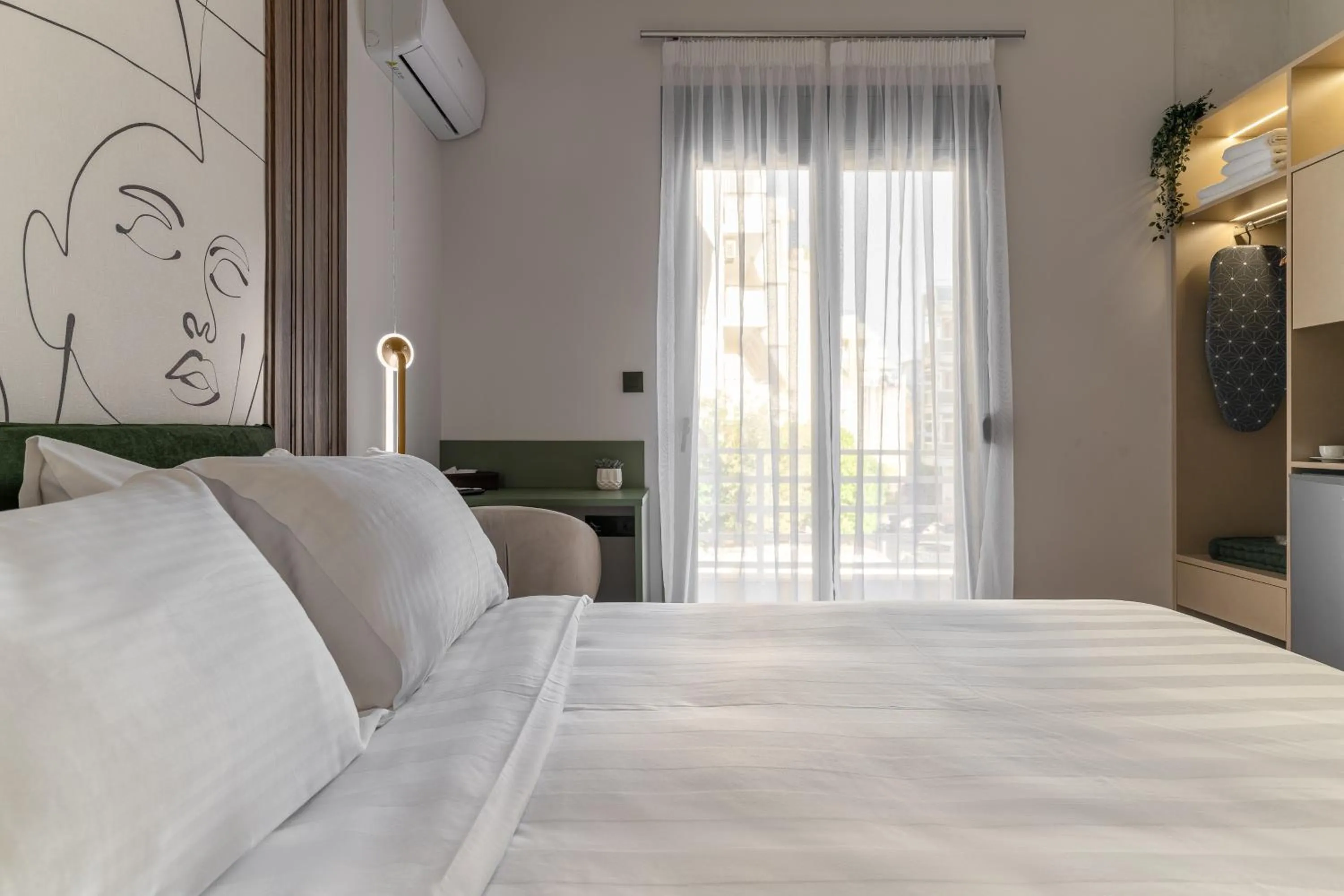 Bed in Phalerus Suites