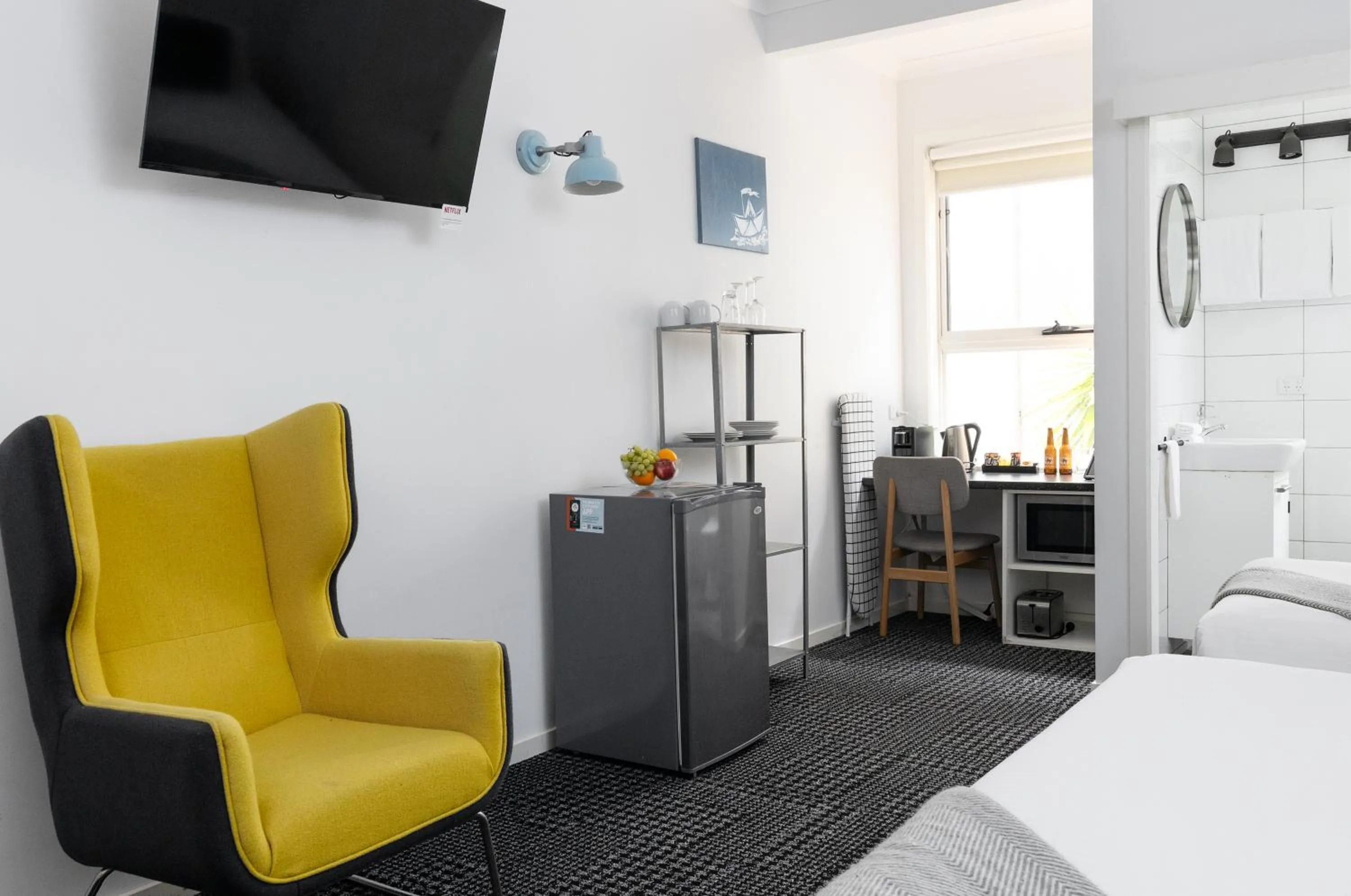 Bed in Siesta Central Apartments