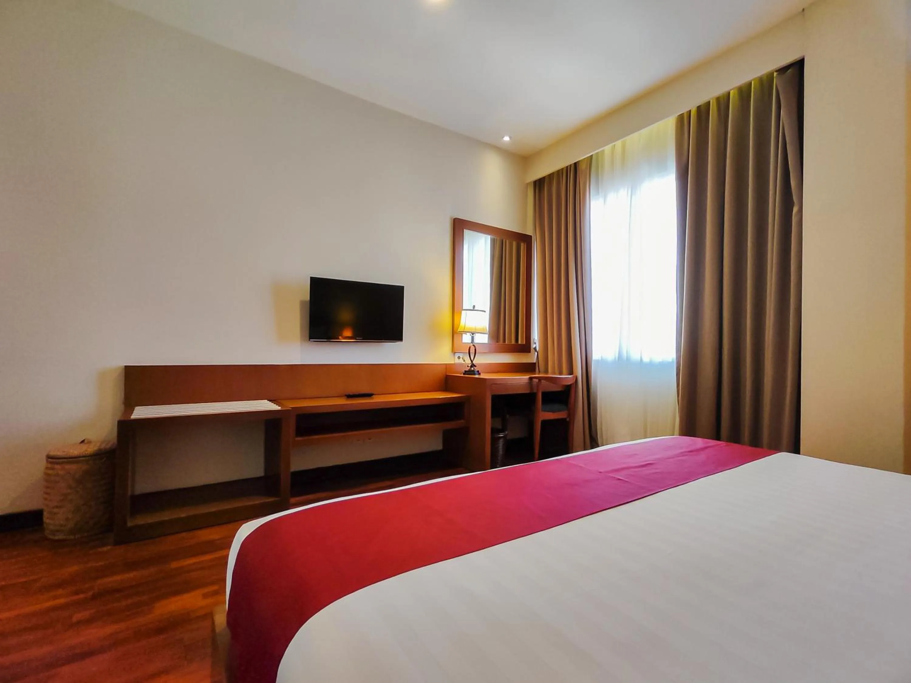 Bed in Seminyak Square Hotel And Villas