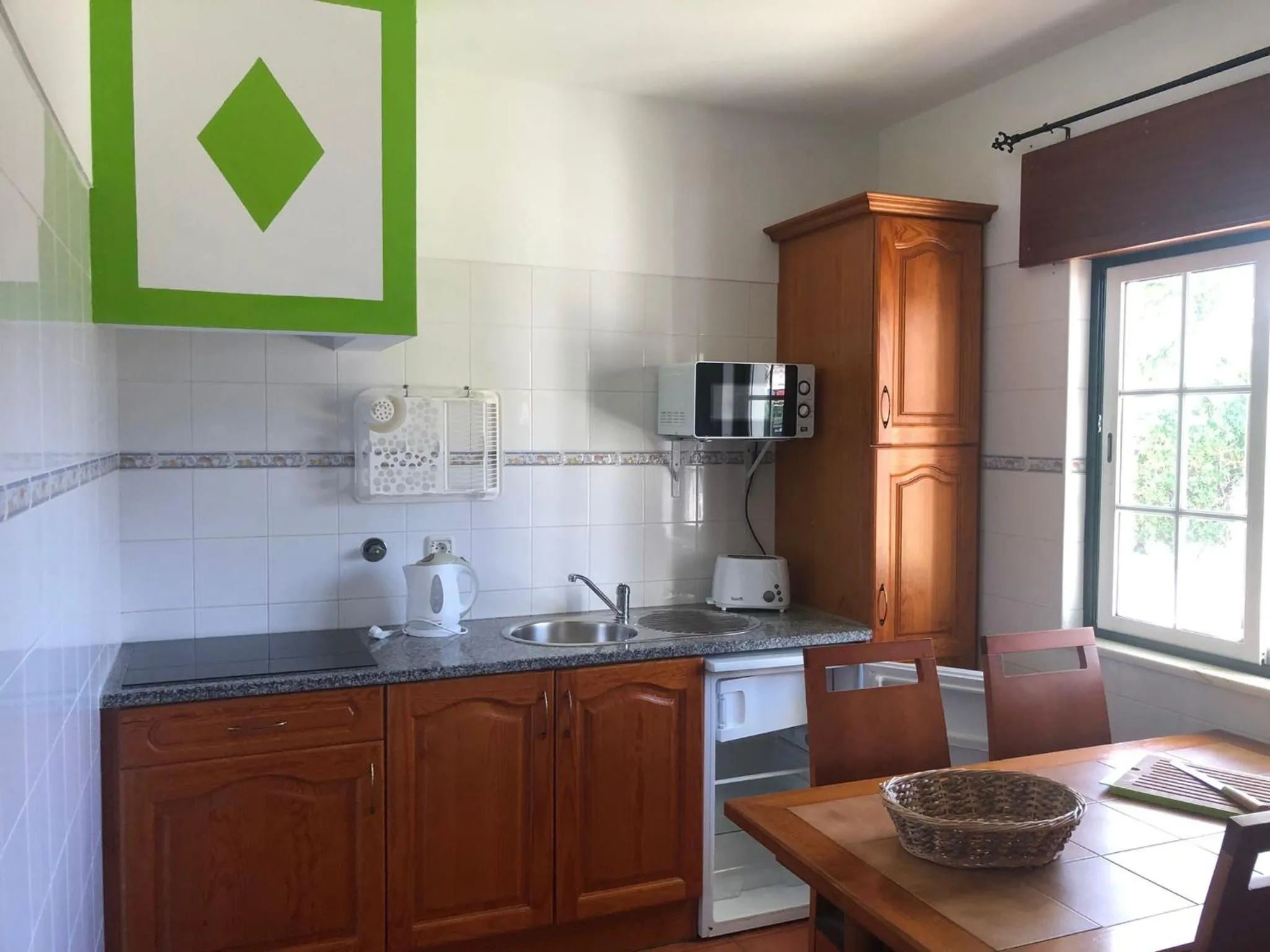 Kitchen or kitchenette in Camping Villa Park Zambujeira do Mar