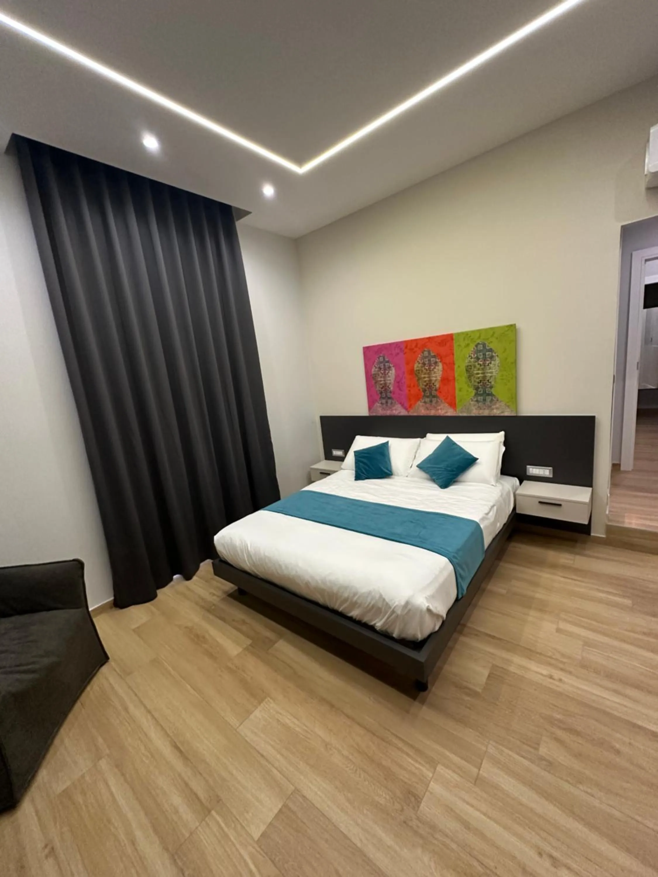 Bed in Hotiday Napoli Astoria