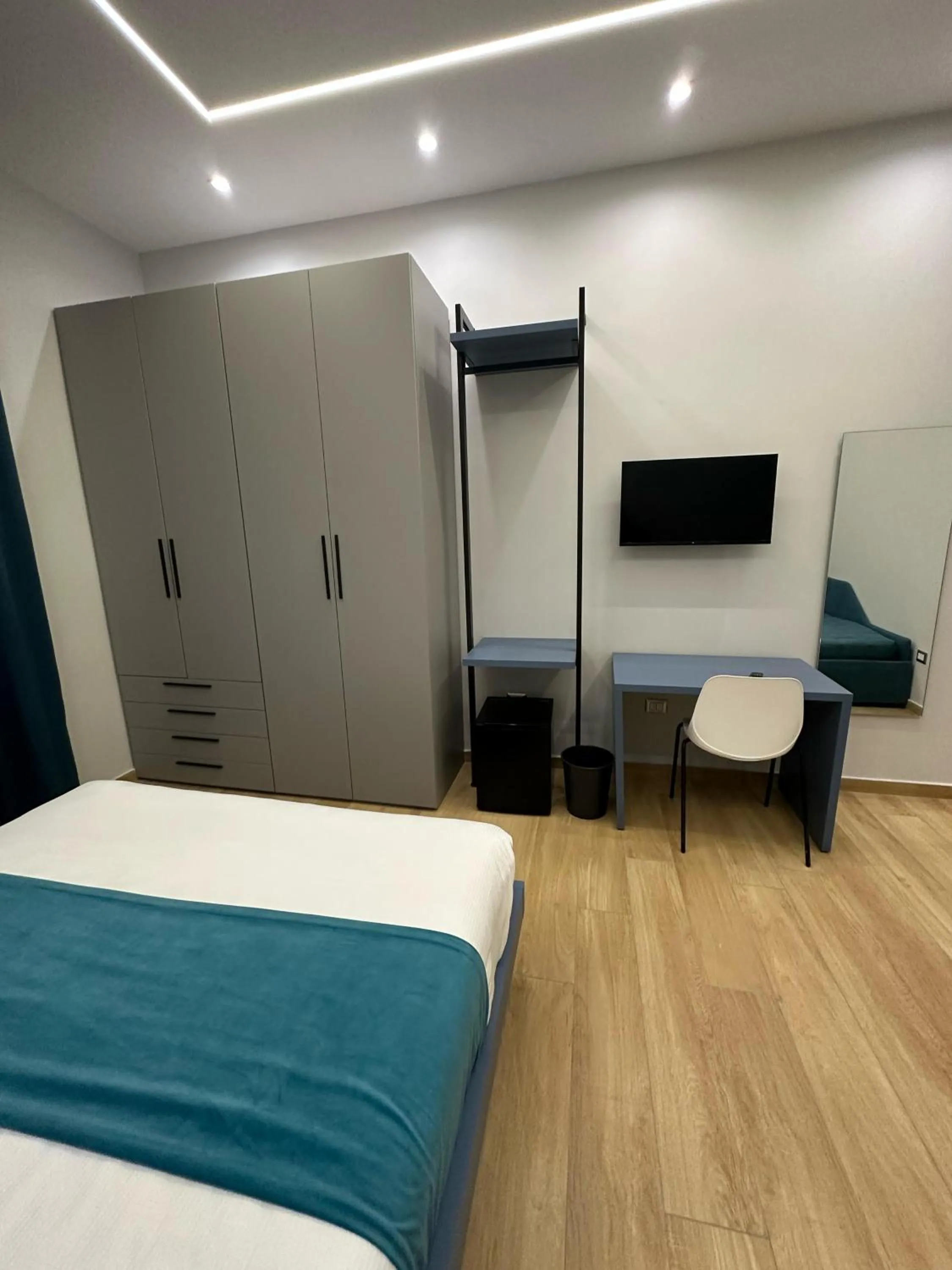 Bed in Hotiday Napoli Astoria