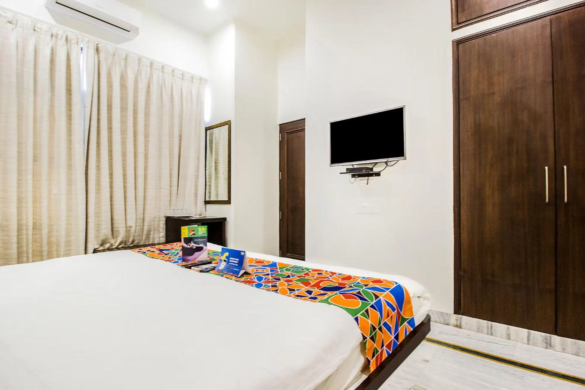 Bed in FabHotel Jaipur Villa