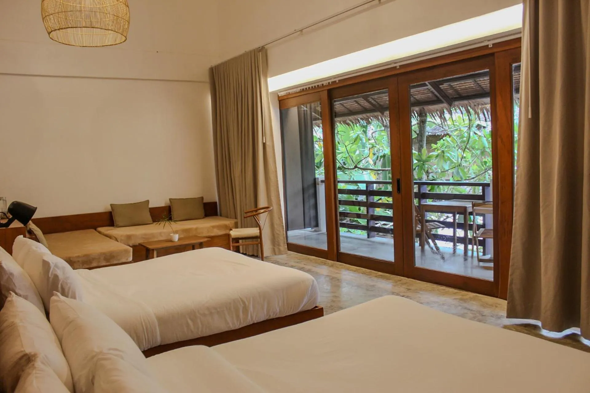 Photo of the whole room, Bed in The Henry Resort Siargao at Kermit