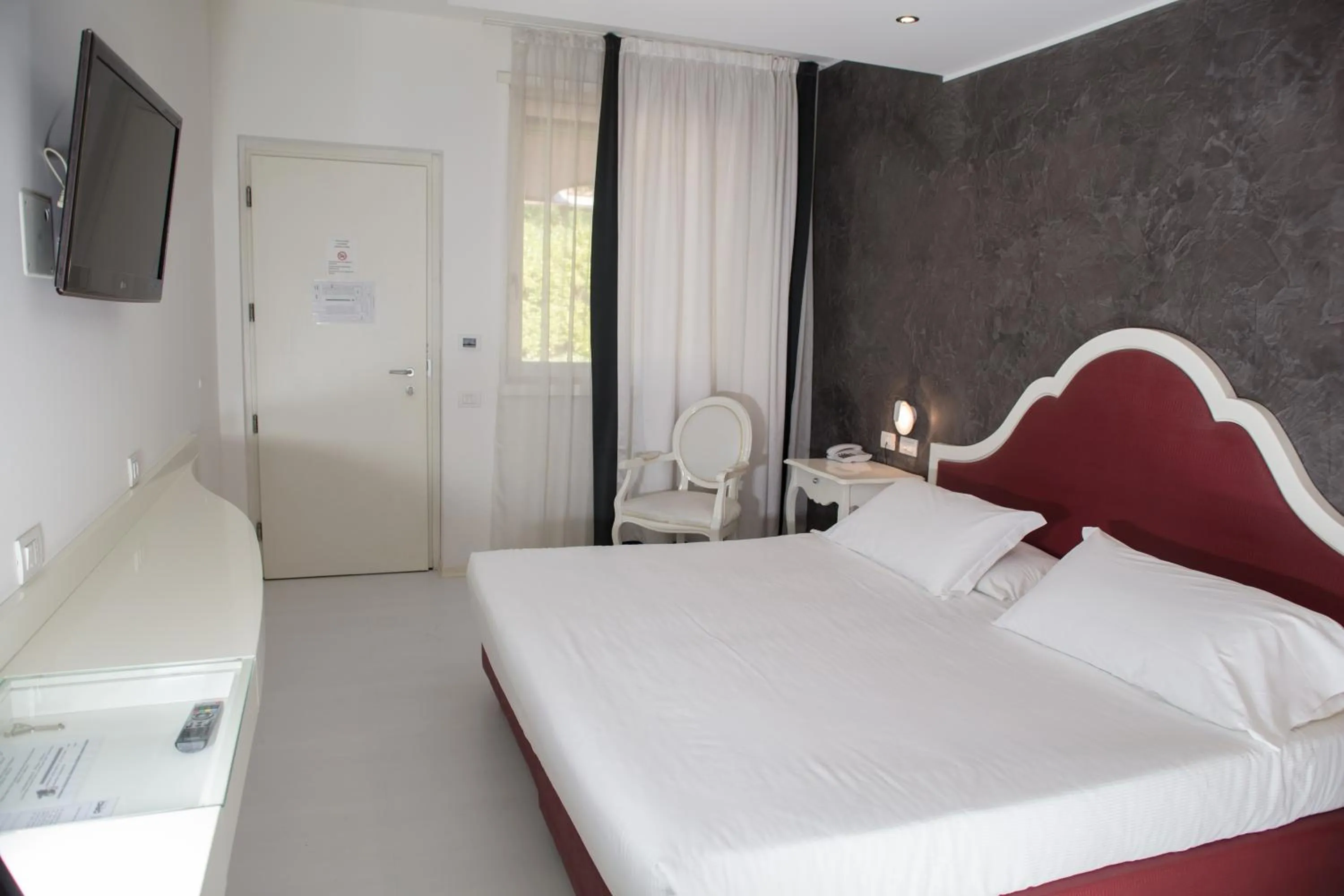 Bed in Blue Relais Maggiore