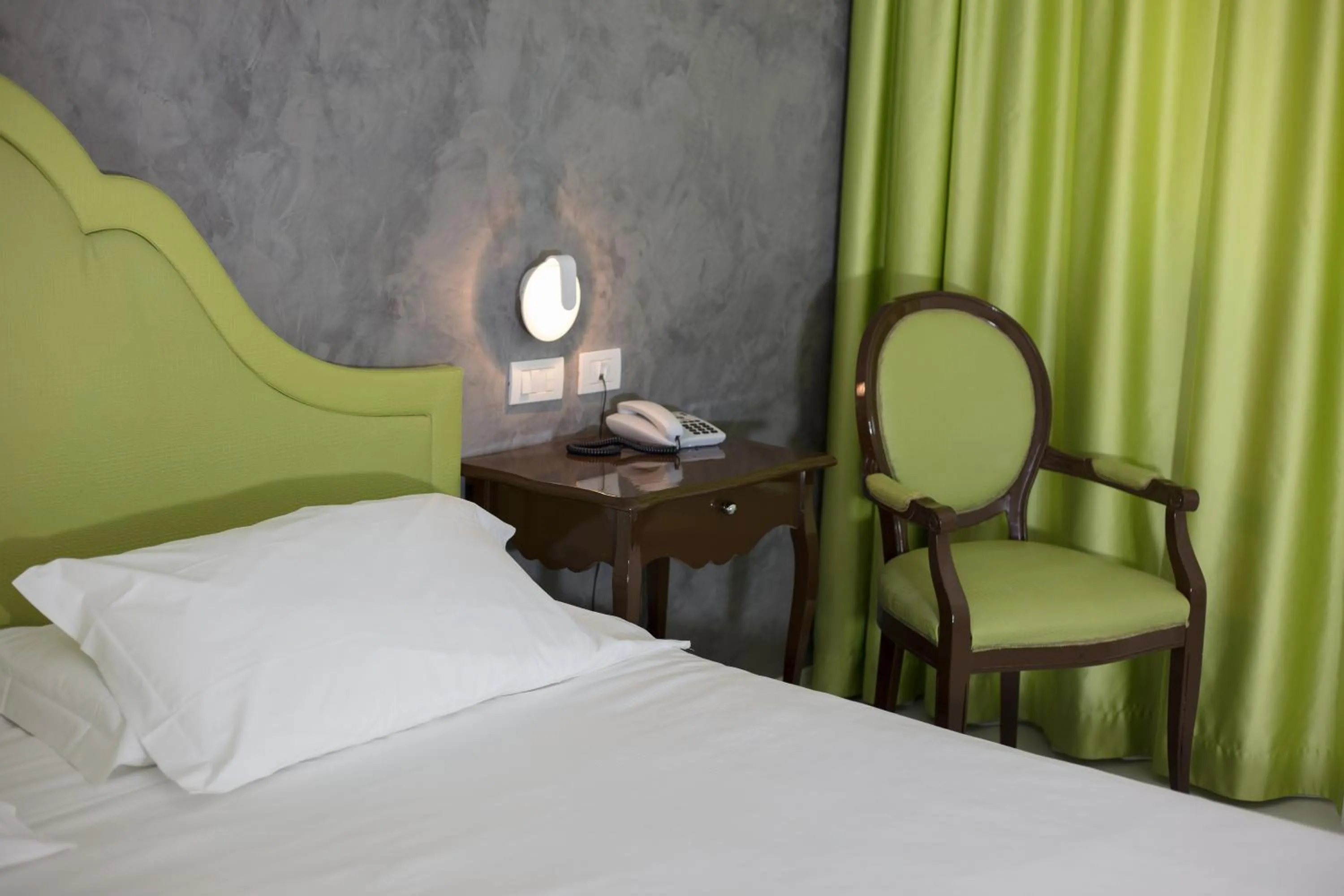 Bed in Blue Relais Maggiore