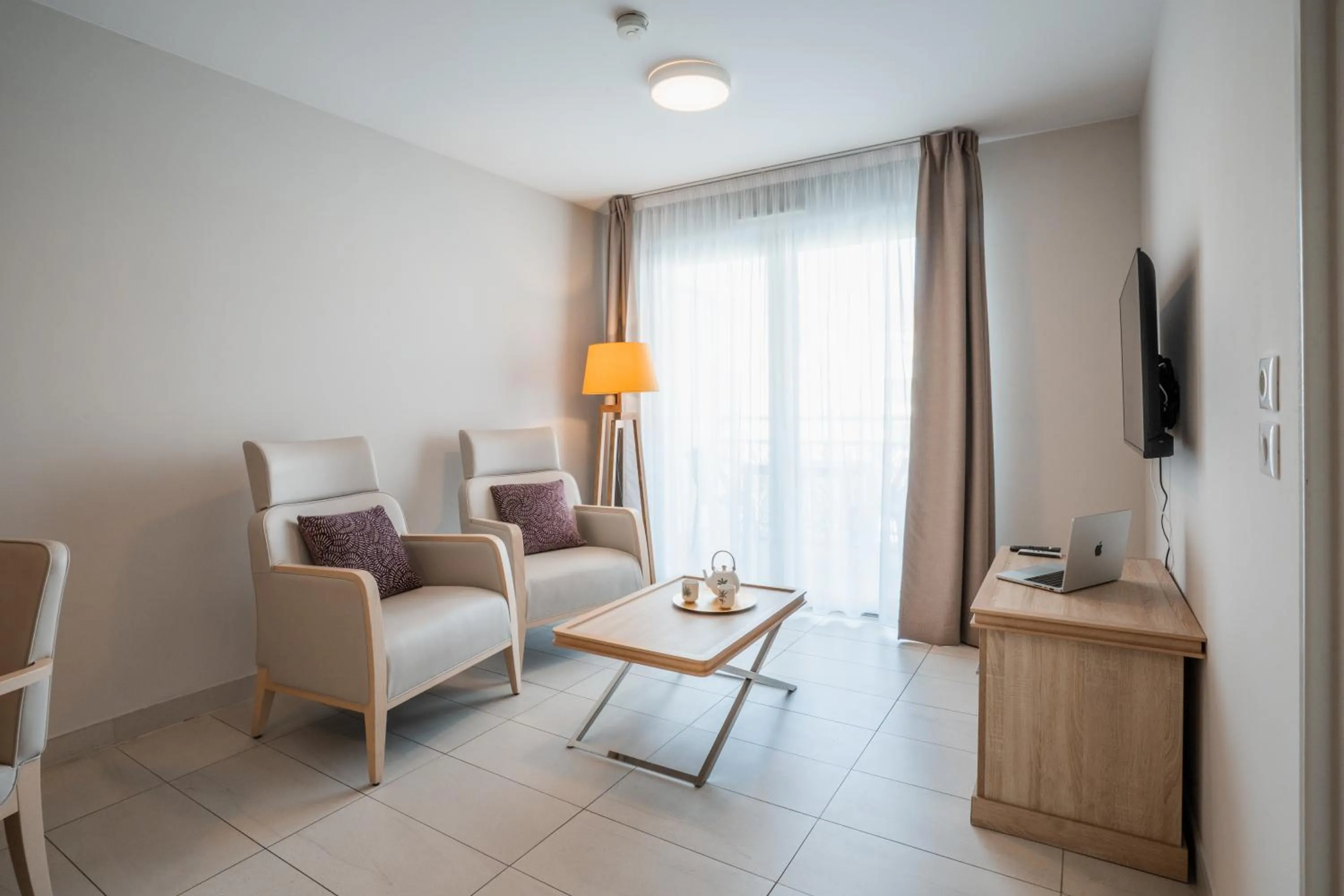 Living room in Zenitude Quality Aparthotel Nice