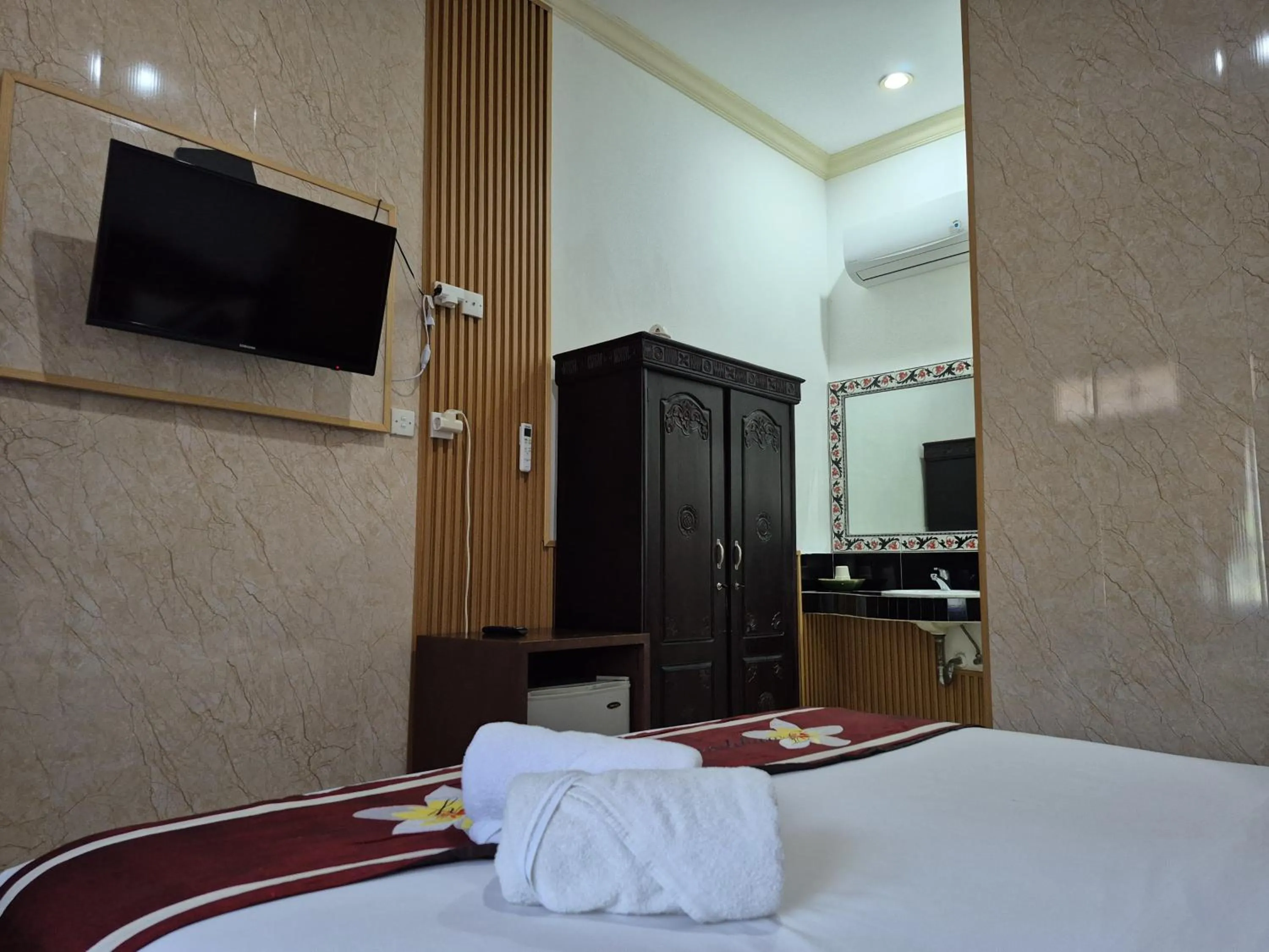 Bed in Frangipani Homestay