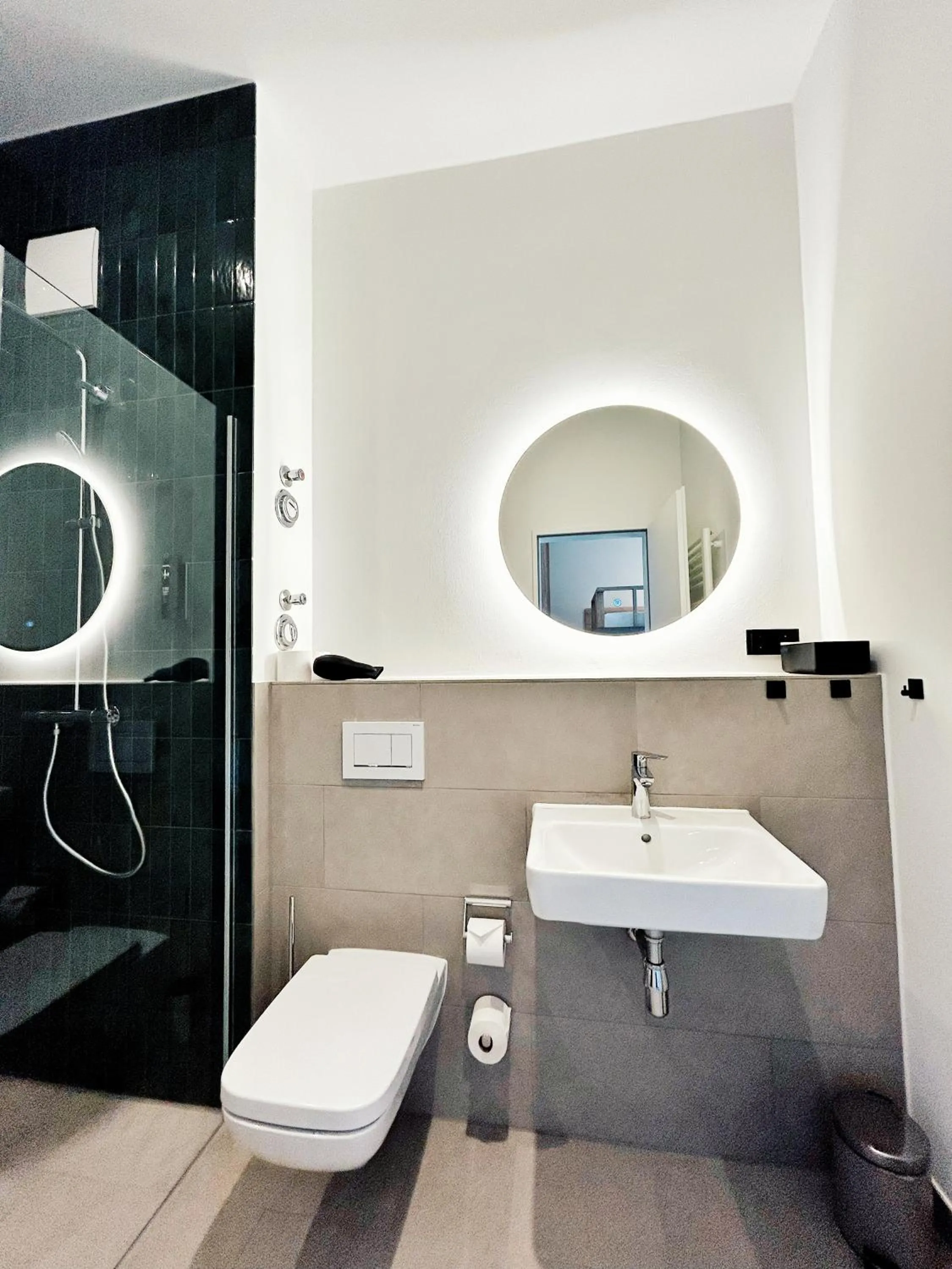 Shower in Homaris Apartments Winterhude