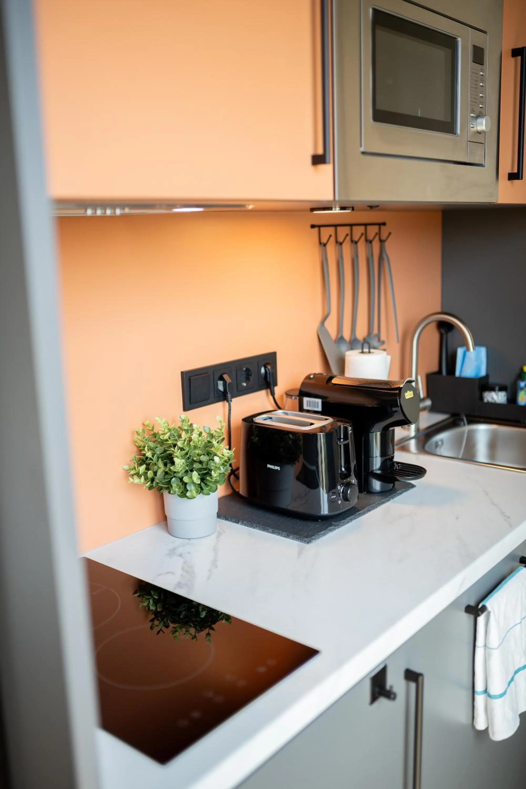 Kitchen or kitchenette in Homaris Apartments Winterhude