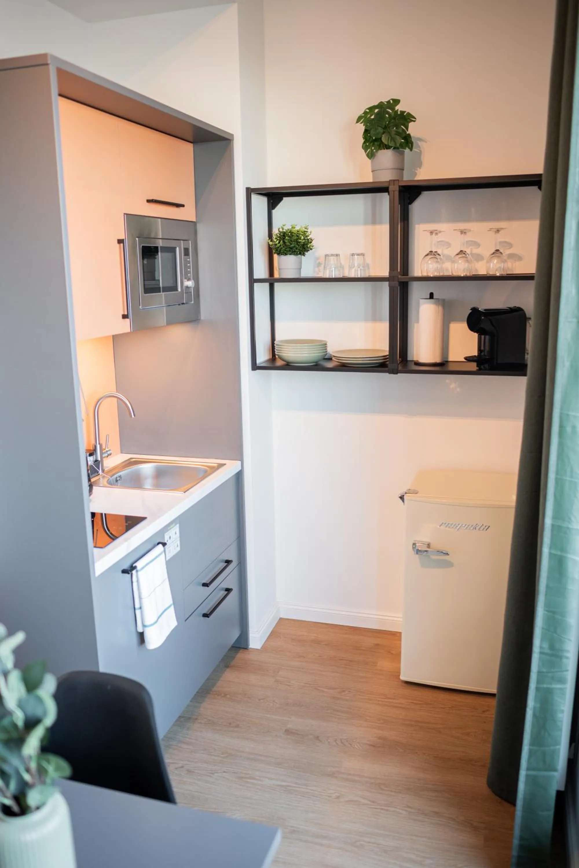 Kitchen or kitchenette in Homaris Apartments Winterhude