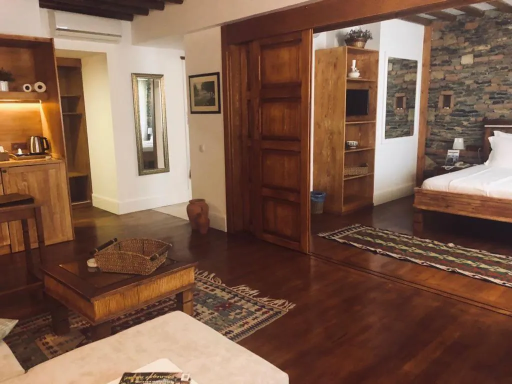 Bed in El Vino Hotel & Suites