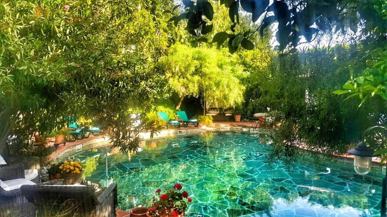 Swimming pool in El Vino Hotel & Suites