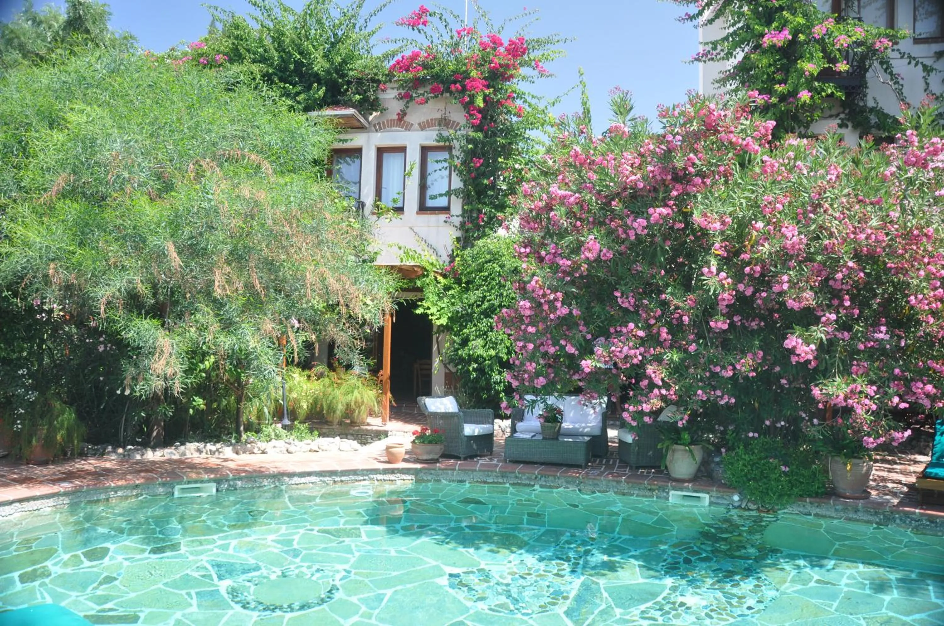 Swimming pool in El Vino Hotel & Suites