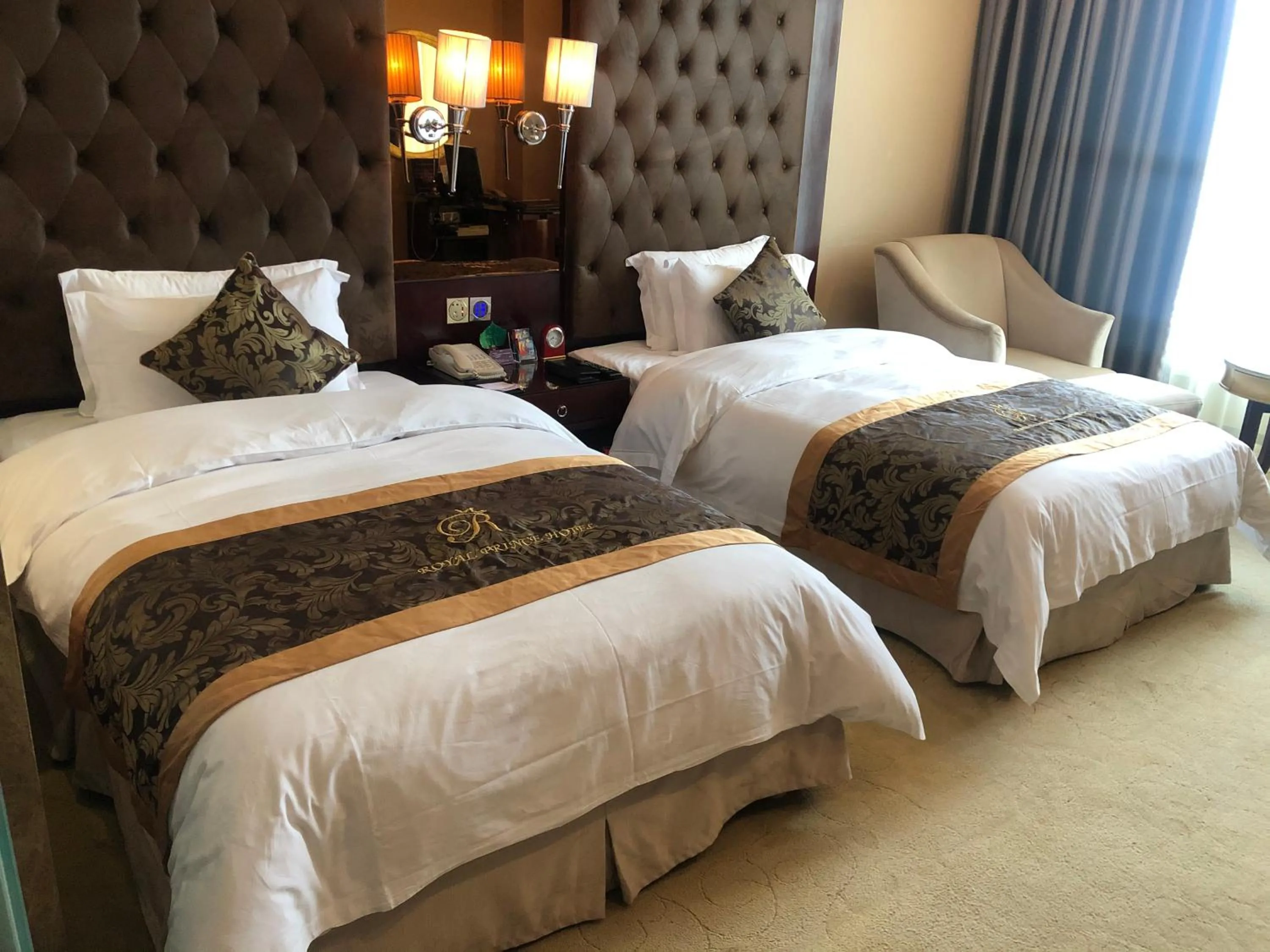 Bed in Foshan Royal Prince Hotel
