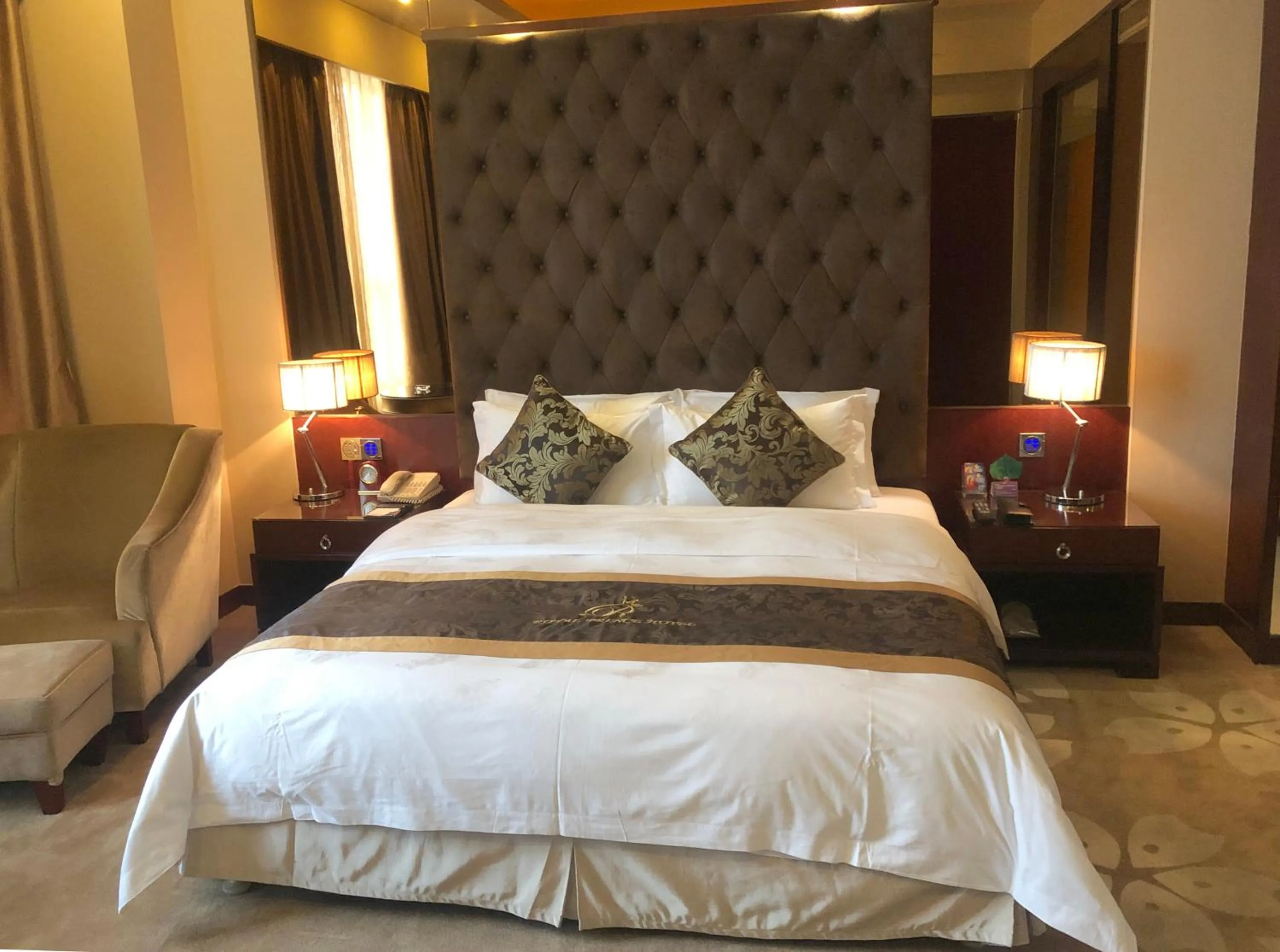 Bed in Foshan Royal Prince Hotel